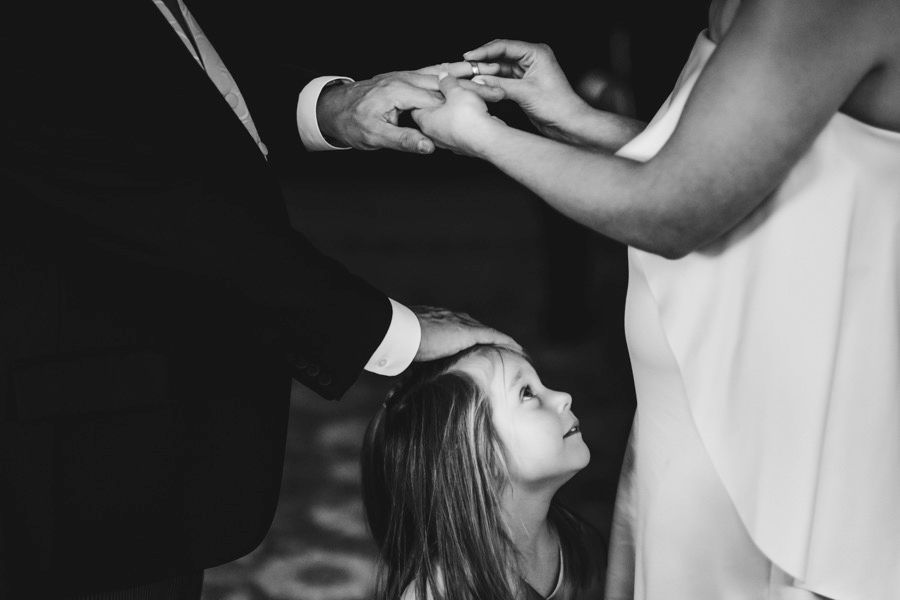 Wedding party preparing together in emotional moments before the ceremony.