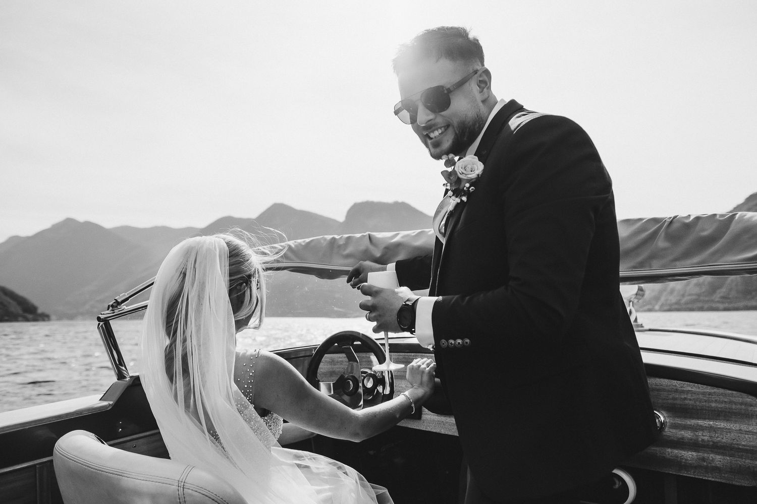 Black and white wedding photos captured against a scenic mountain backdrop.