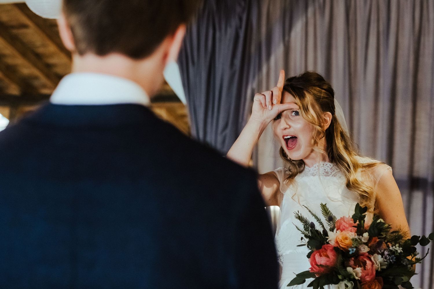 Elegant wedding reception setting with dramatic lighting and emotional moments.