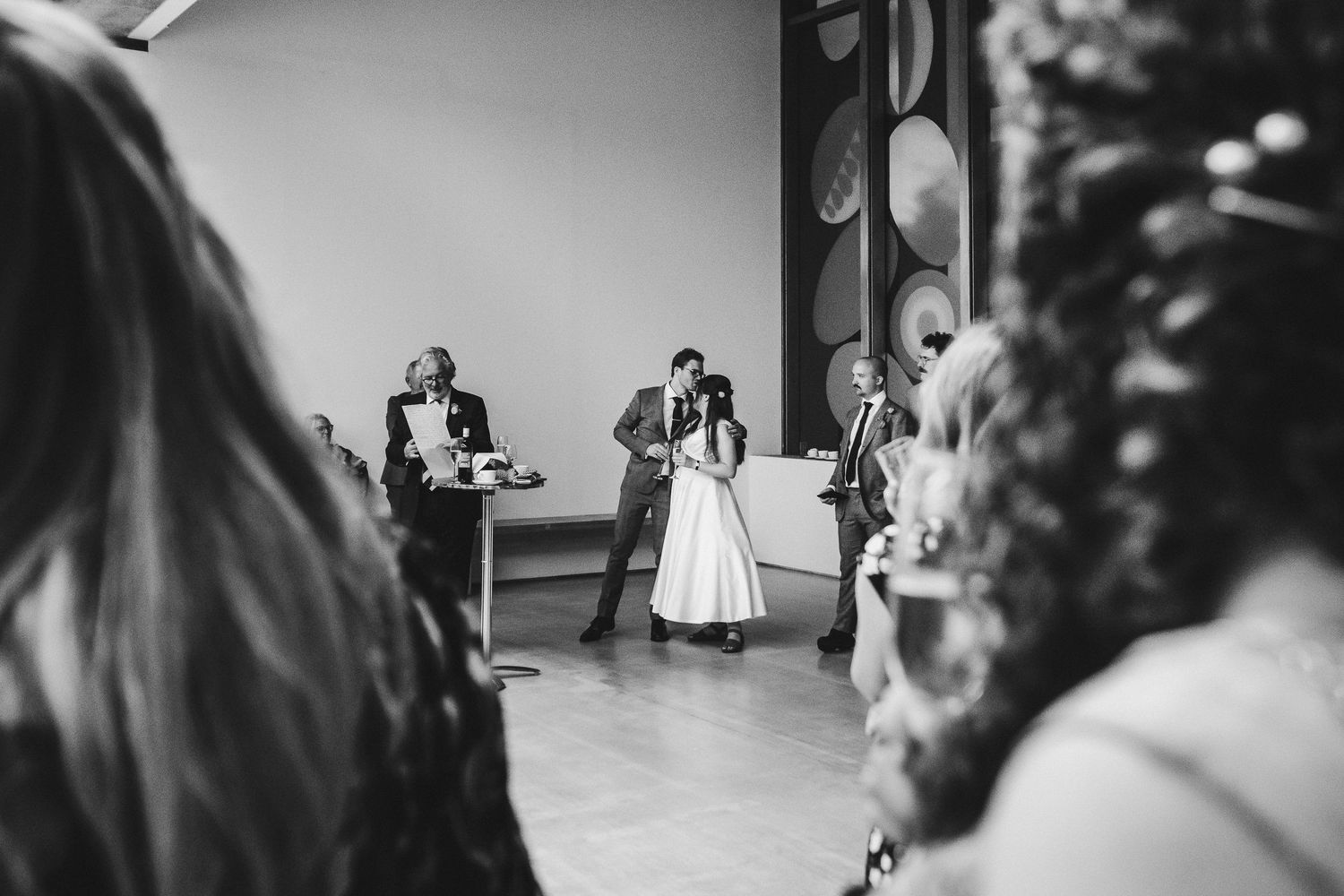 Artistic black and white composition of wedding preparations and candid moments.