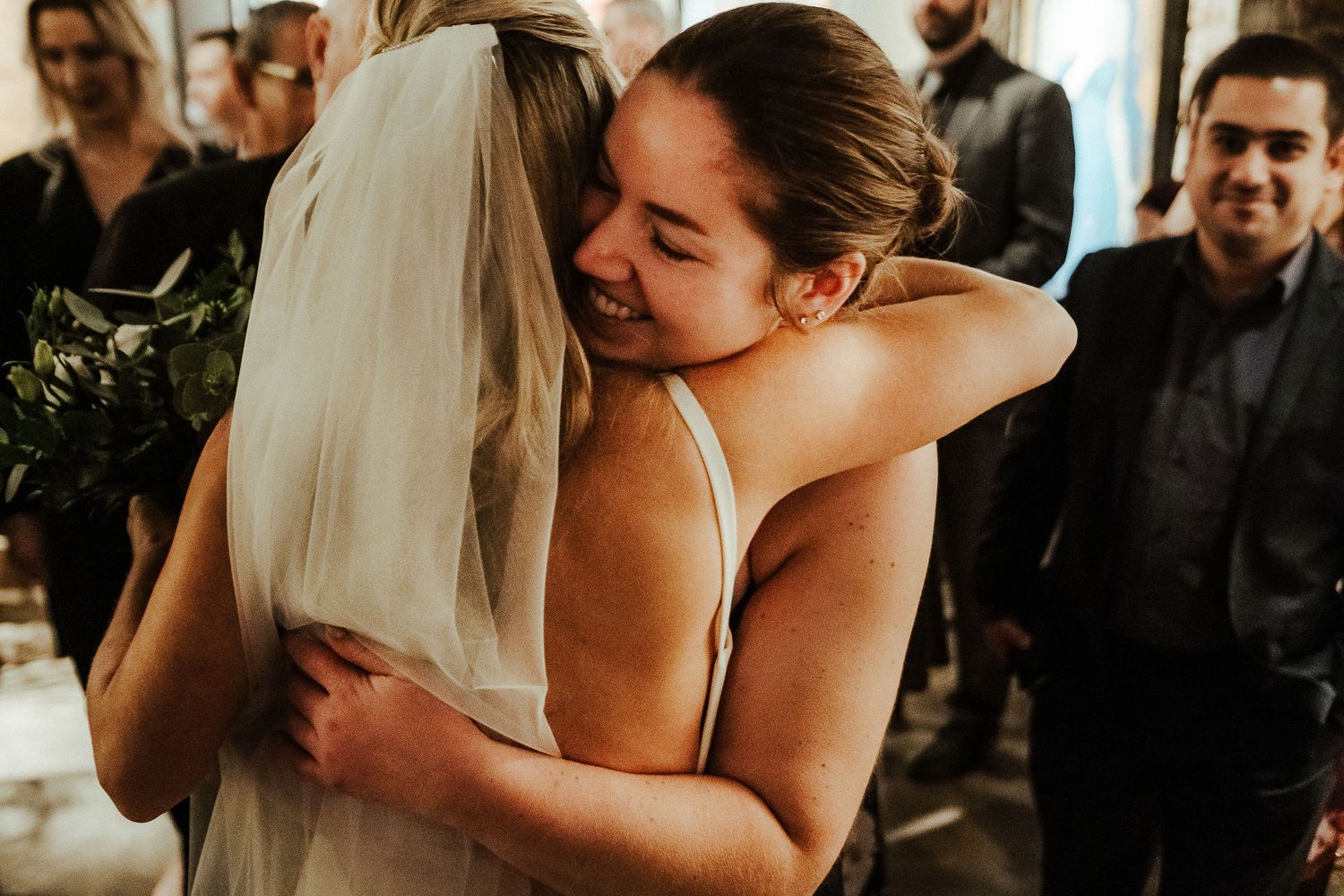 An intimate moment shared between two people during a wedding celebration.