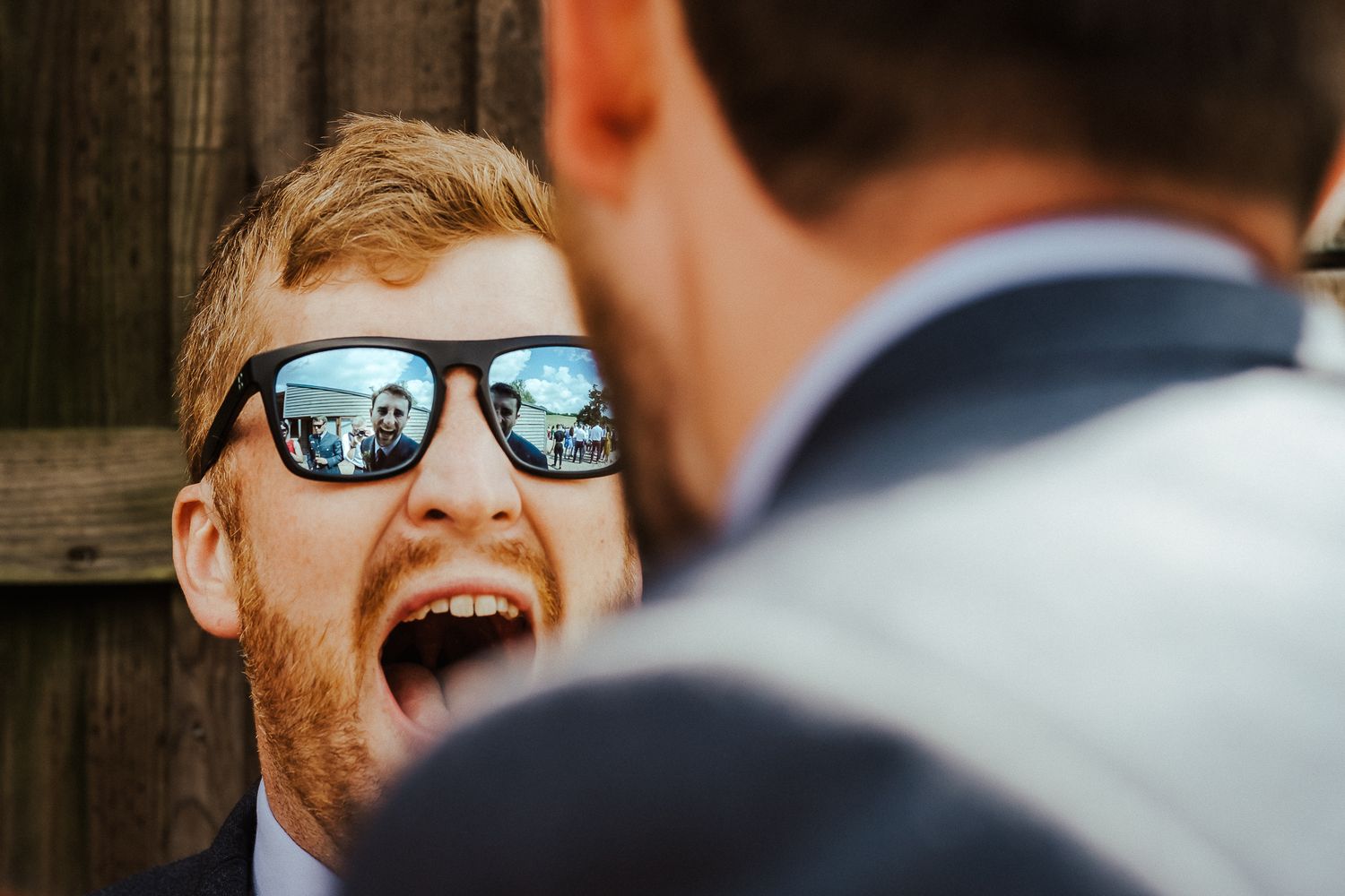 Close up of tender wedding moments showing love and affection at a waterfront celebration.