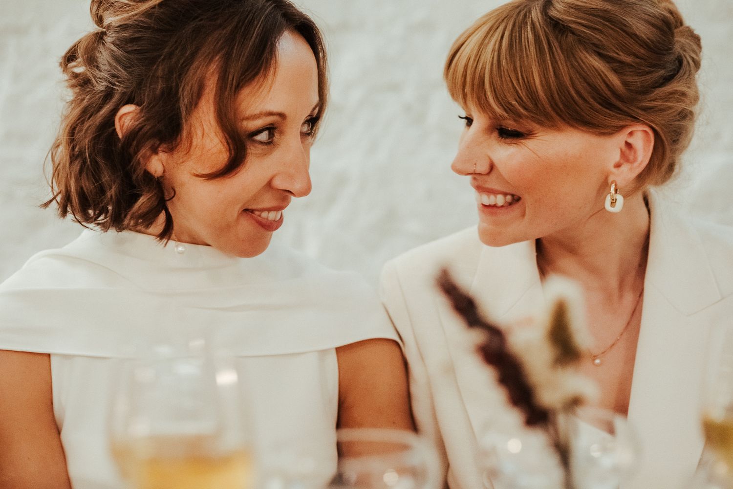Wedding couple shares intimate moments during their reception celebration.