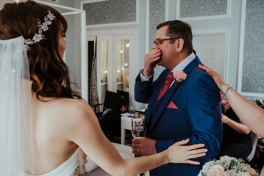 Intimate wedding celebration moments captured in an elegant indoor setting.
