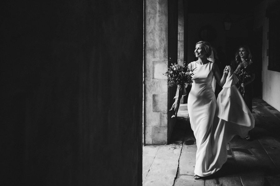 Black and white photos of couples in an elegant architectural setting.
