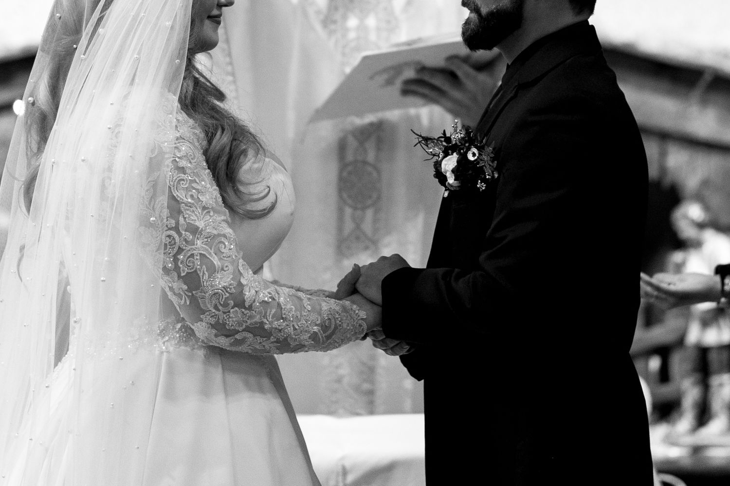 Black and white photo sequence of a bride and groom during their wedding ceremony in different tender moments.