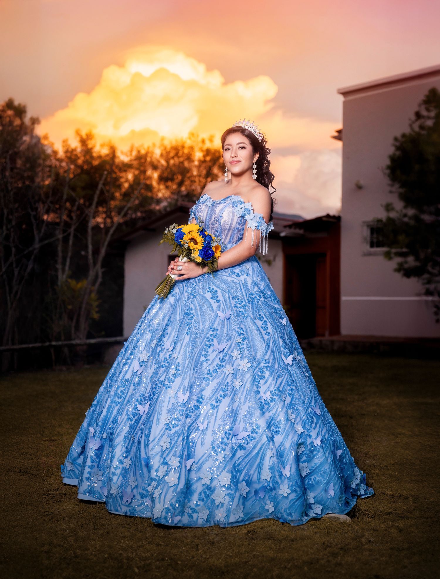 A display of photos showing someone in a flowing blue quinceañera dress posing against a vibrant sunset background.