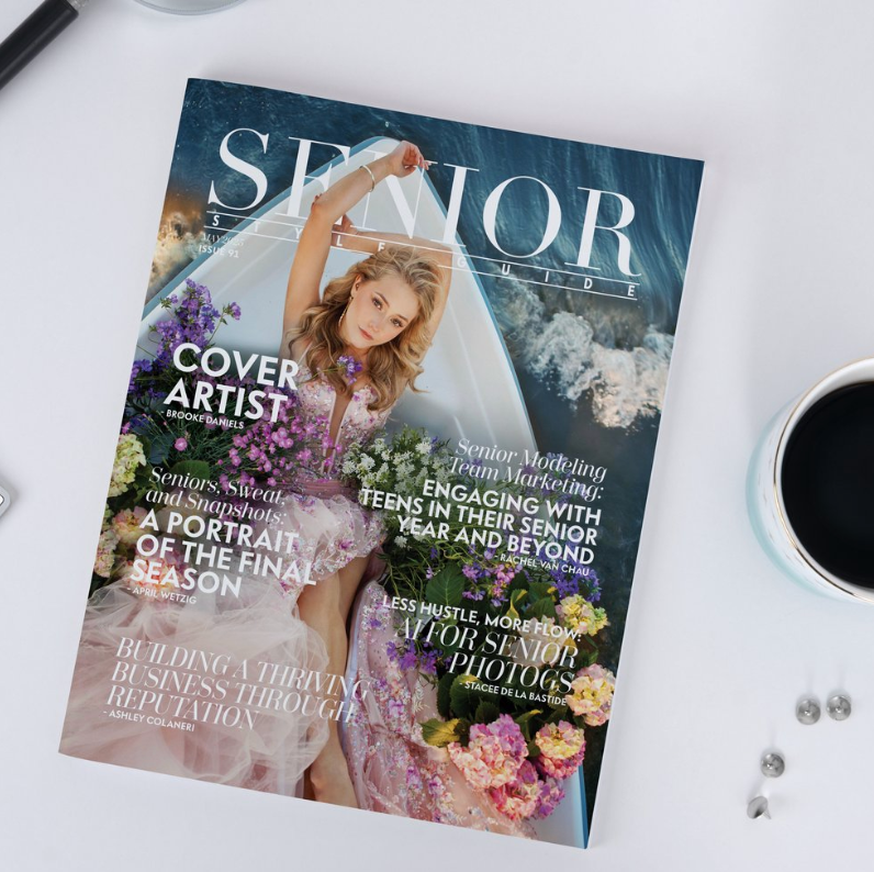 A magazine cover titled 'SENIOR' featuring a floral design and photography theme with text overlays on a white desk surface.