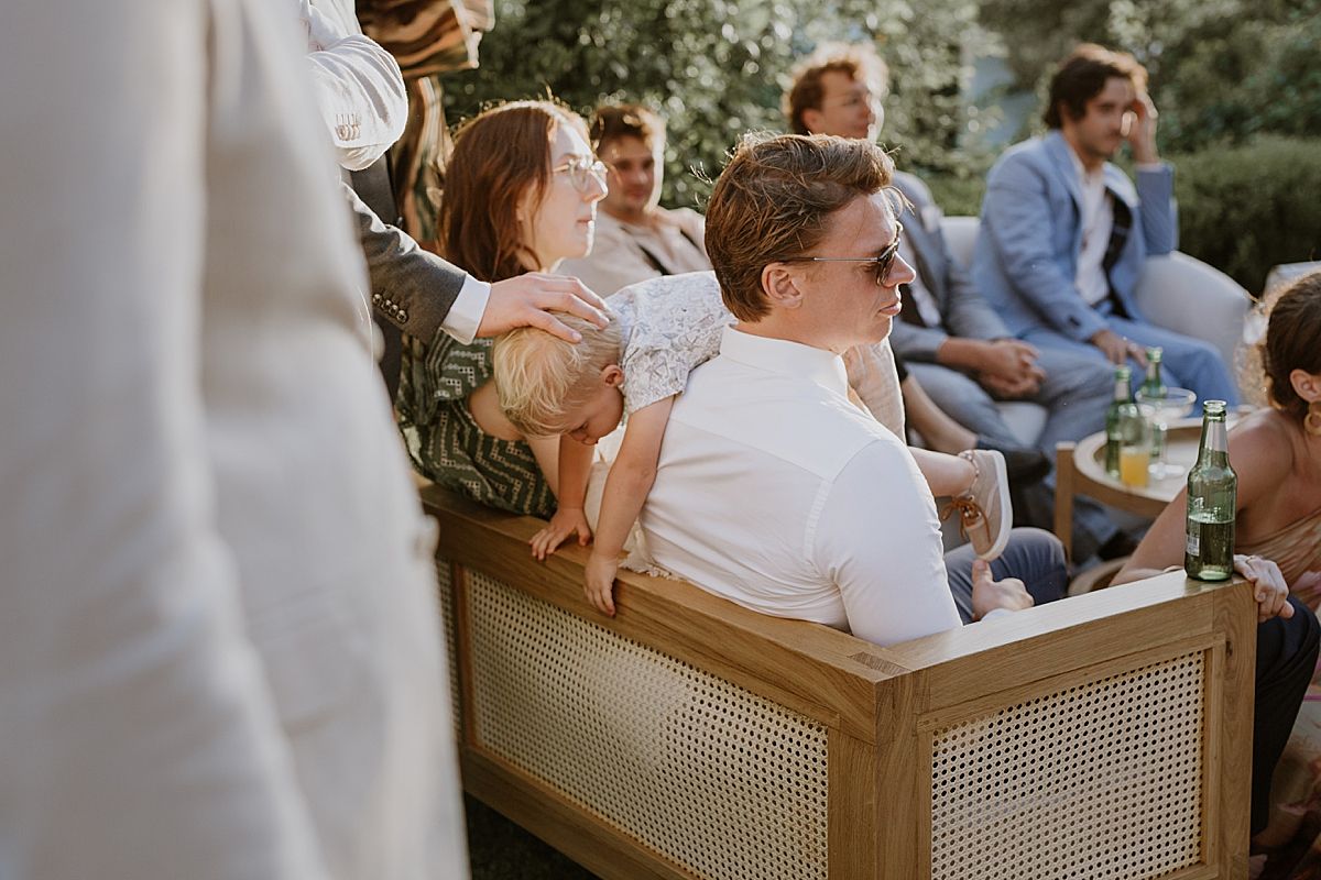 Wedding guests enjoying a relaxed celebration in Penhill Farm gardens