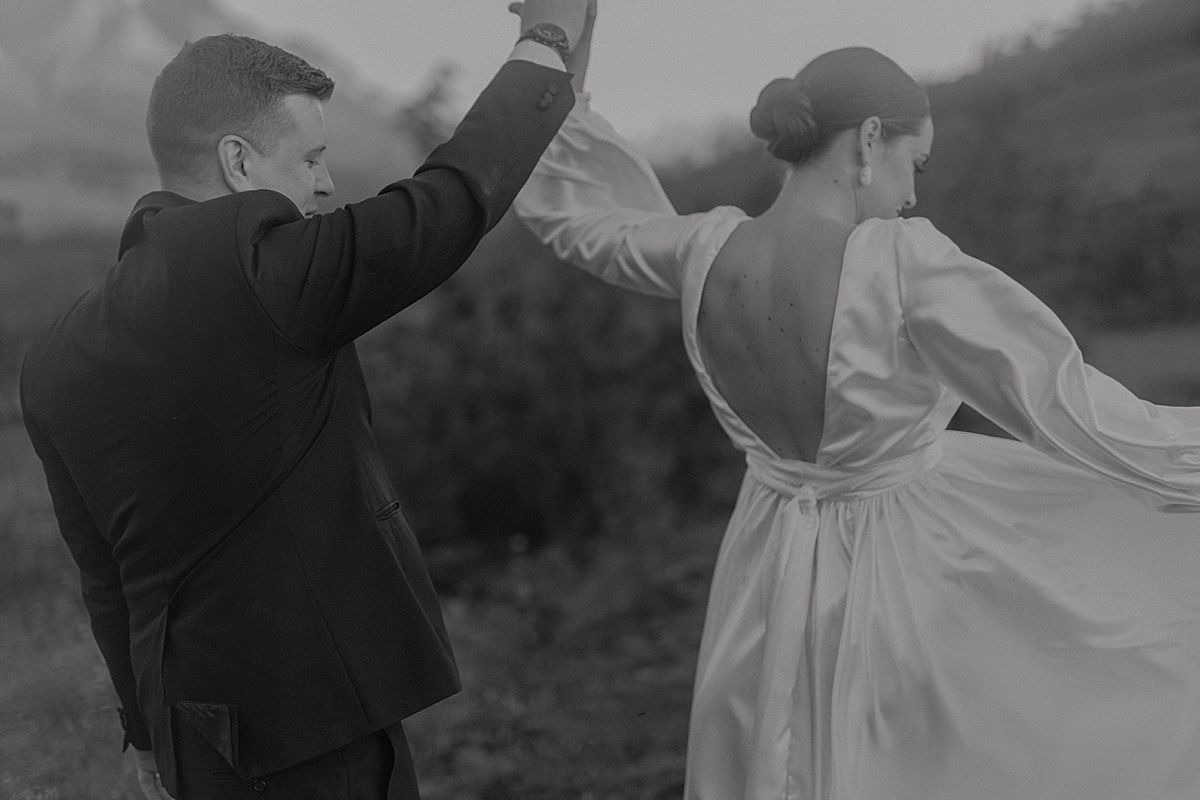 Bride and groom sharing a tender moment in golden sunlight at Cape Town wedding