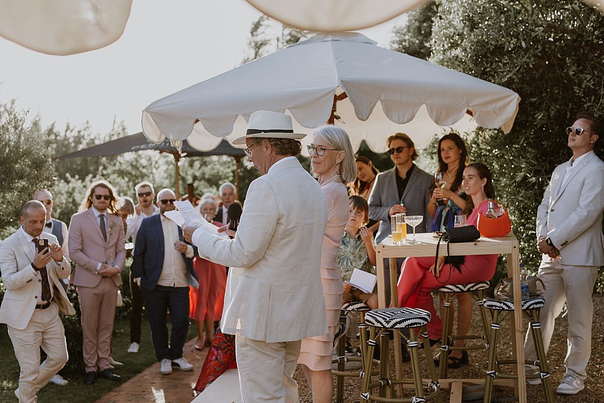Wedding guests enjoying a relaxed celebration in Penhill Farm gardens