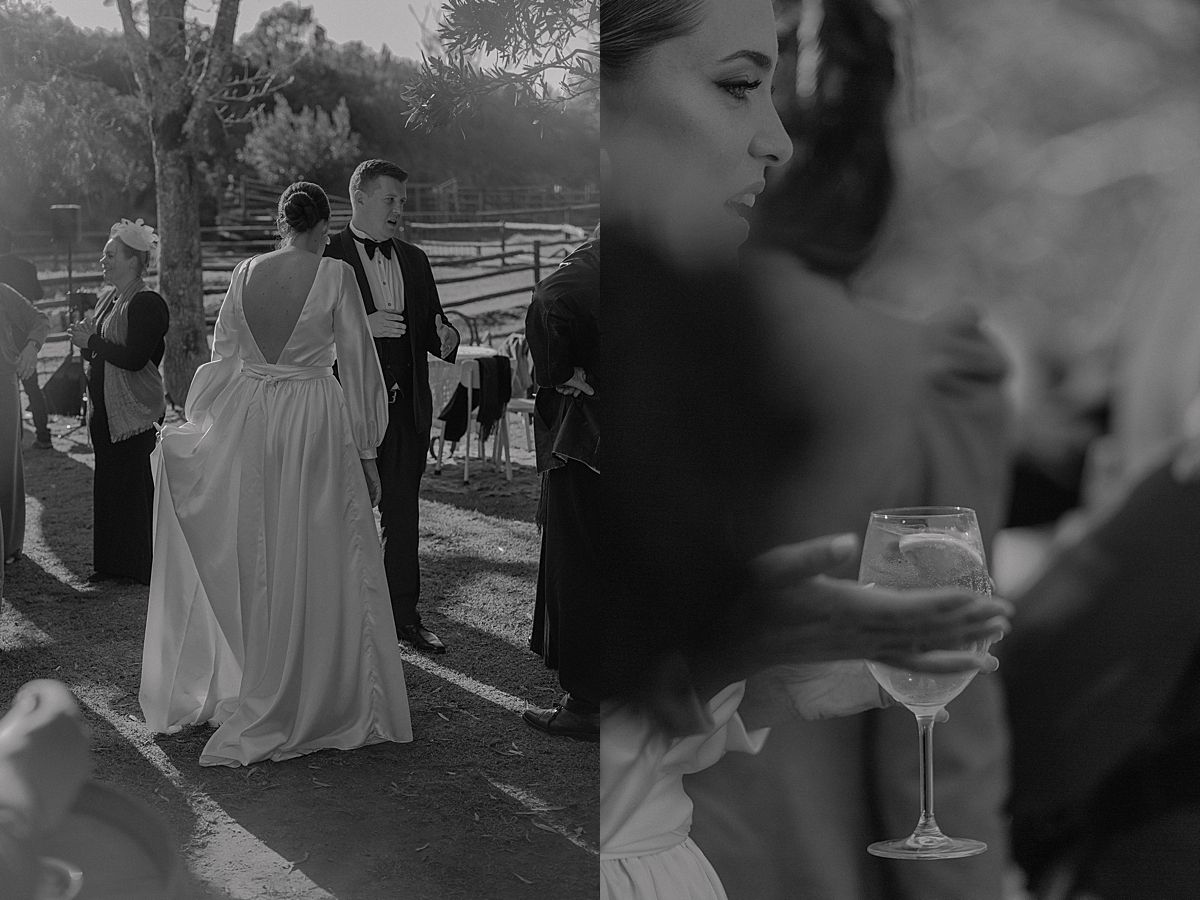 Guests raising glasses for a joyful wedding toast in stylish venue