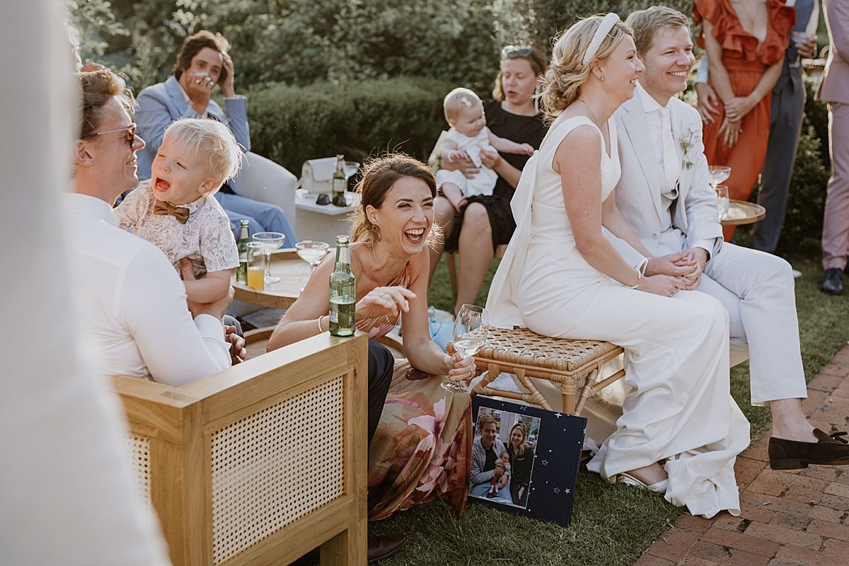 Wedding guests enjoying a relaxed celebration in Penhill Farm gardens