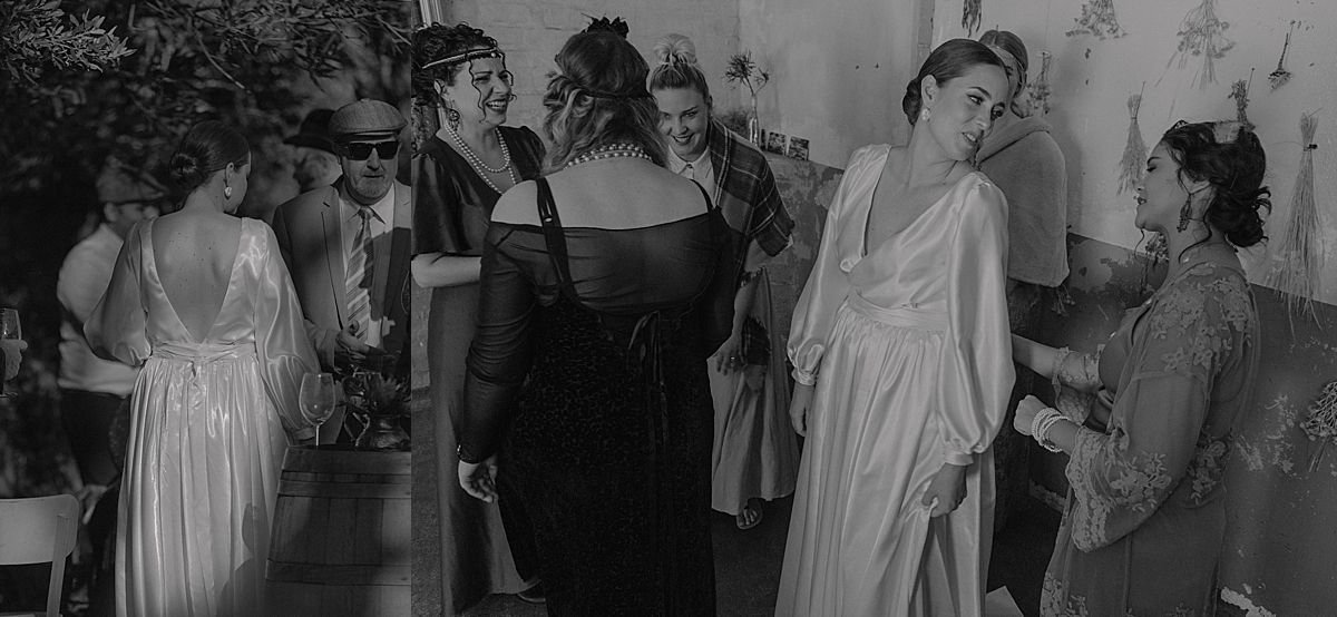 Guests raising glasses for a joyful wedding toast in stylish venue