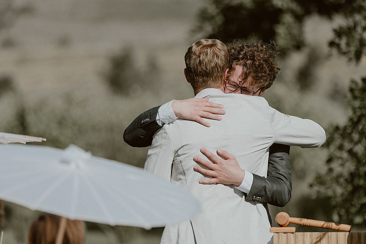 Bride and groom exchanging vows at Penhill Farm
