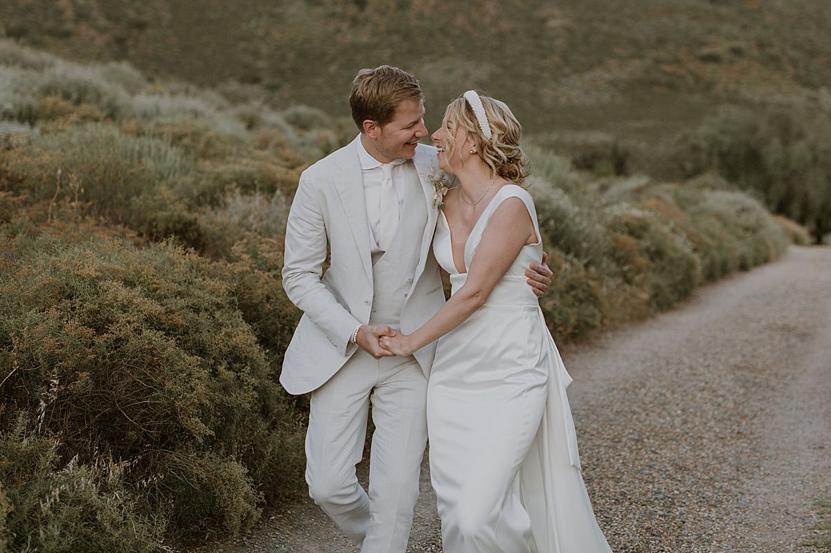 Bride and groom enjoying quiet moment at Penhill Manor captured by kusjka du Plessis
