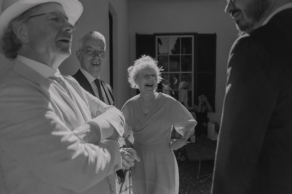 Guests laughing and mingling at intimate Western Cape wedding