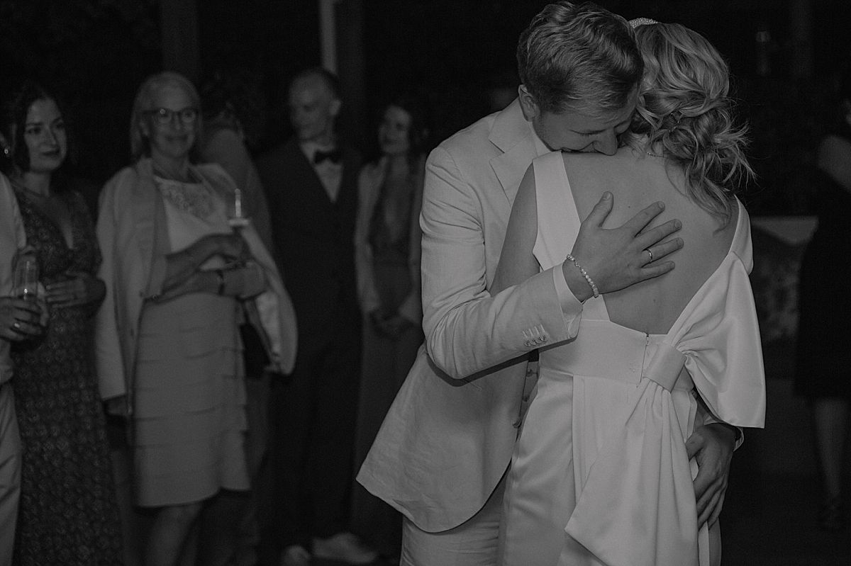 Couple sharing a first dance under soft lighting at Penhill Manor, photographed by Kusjka du Plessis