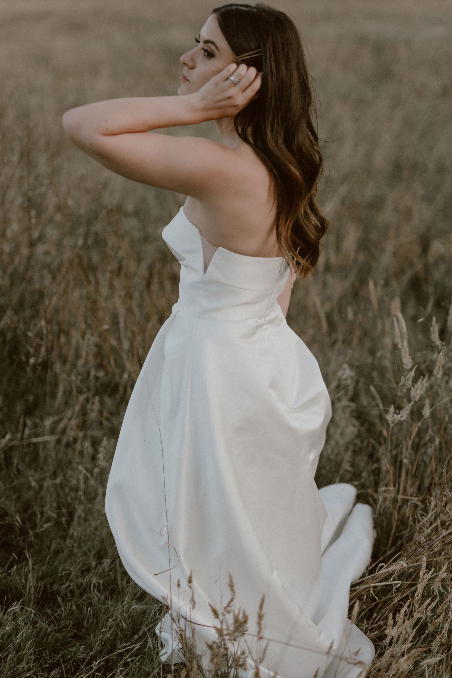 Alegant close-up bridal portrait highlighting delicate makeup and hairstyle