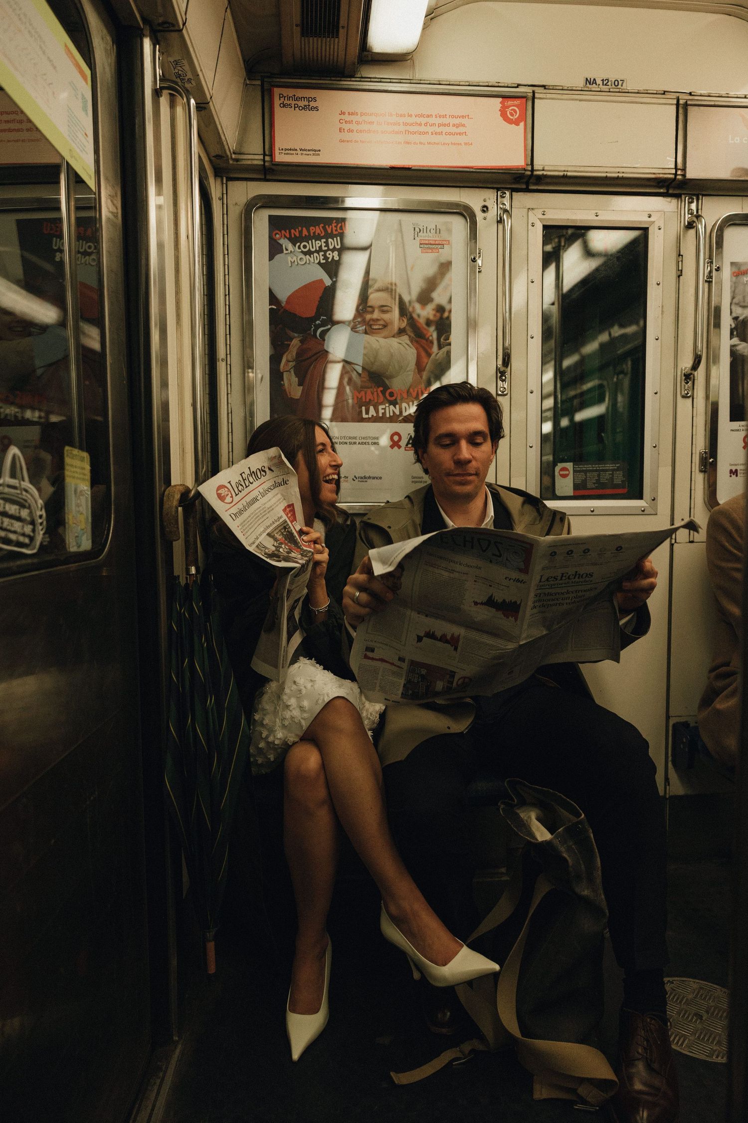 A series of photos showing a newspaper reader on a dimly lit subway train in progressive reading positions.
