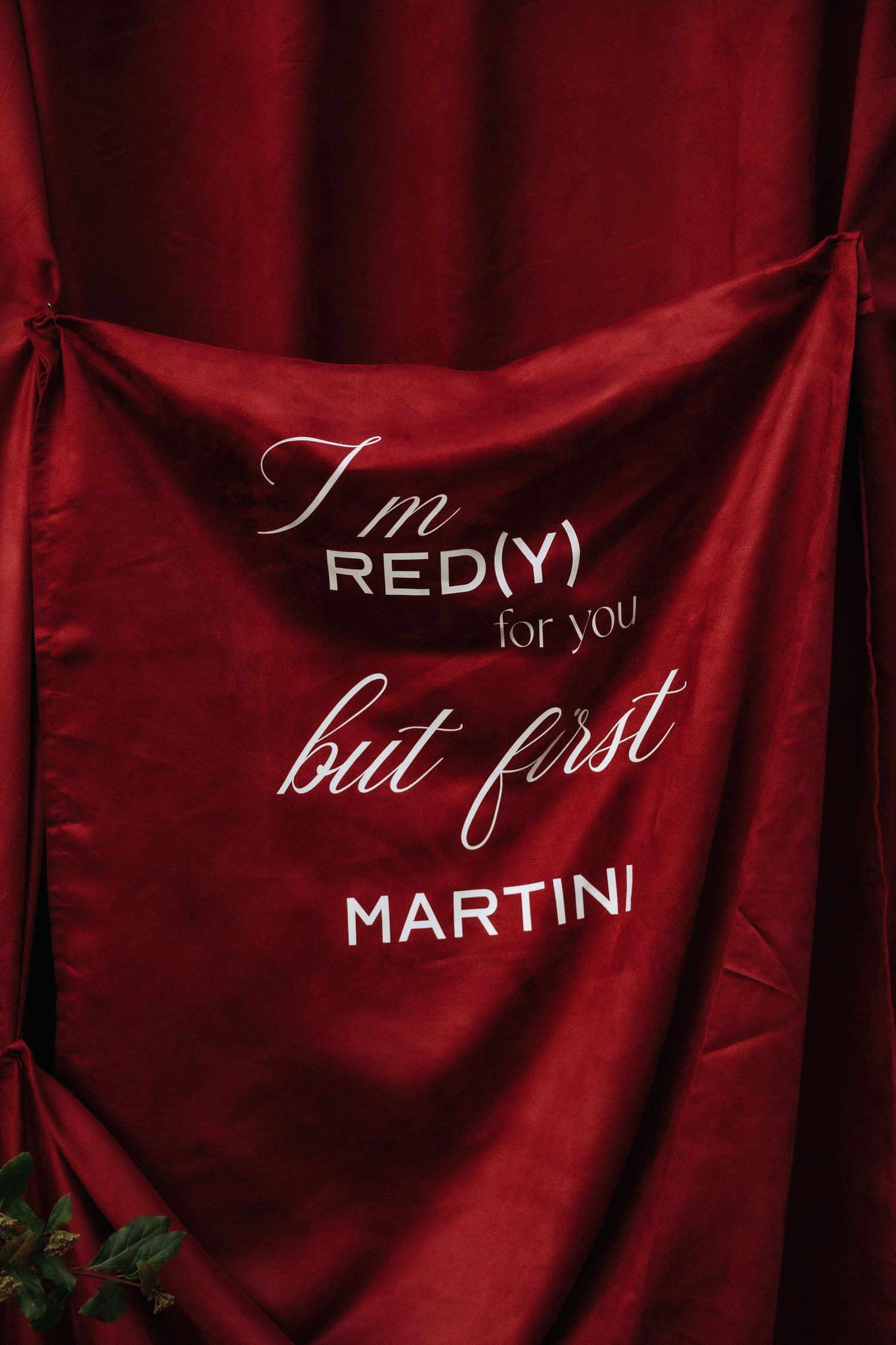 Red velvet banner with white text reading 'I'm red(y) for you but first MARTINI'.