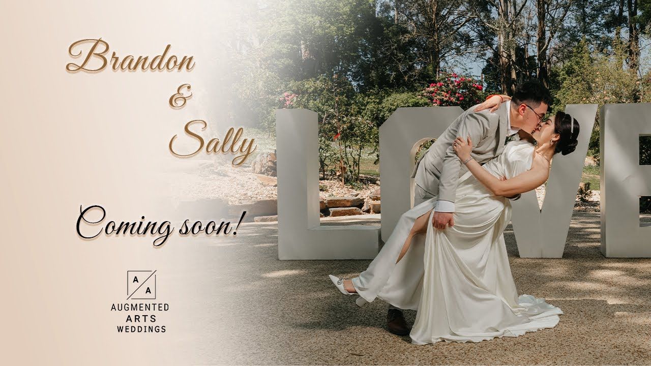 A romantic couple in formal wedding attire dance together under a white outdoor gazebo in warm natural lighting.