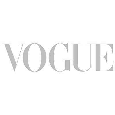 Typography design showing VOGUE magazine logo in light grey color.
