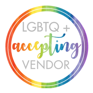 A circular logo with a rainbow border that says 'LGBTQ+ accepting vendor' in colorful and gray text.