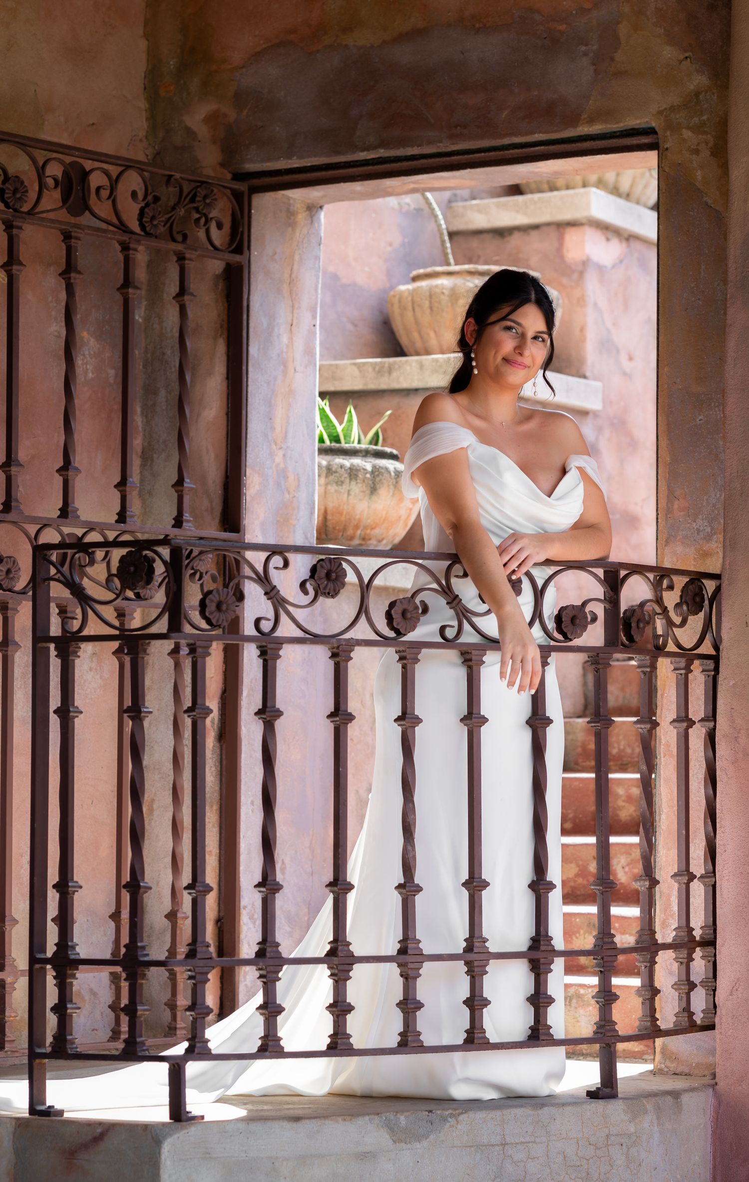 Newlyweds sharing a moment in the antique ballroom at Howey Mansion, documented with editorial flair by Central Florida photographers.