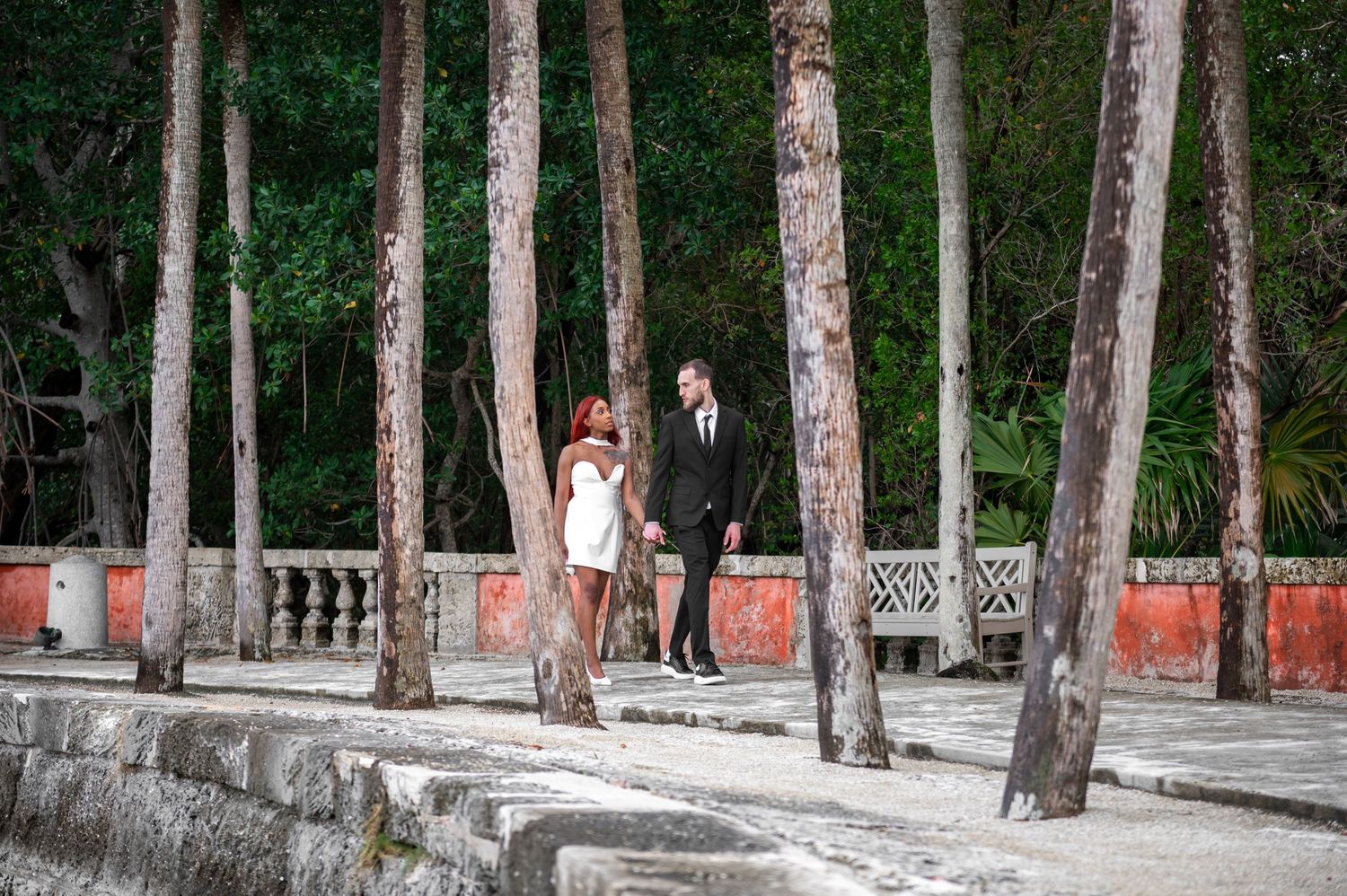 Romantic silhouette at sunset near Vizcaya’s historic columns, documented by top Palm Beach wedding photographers.