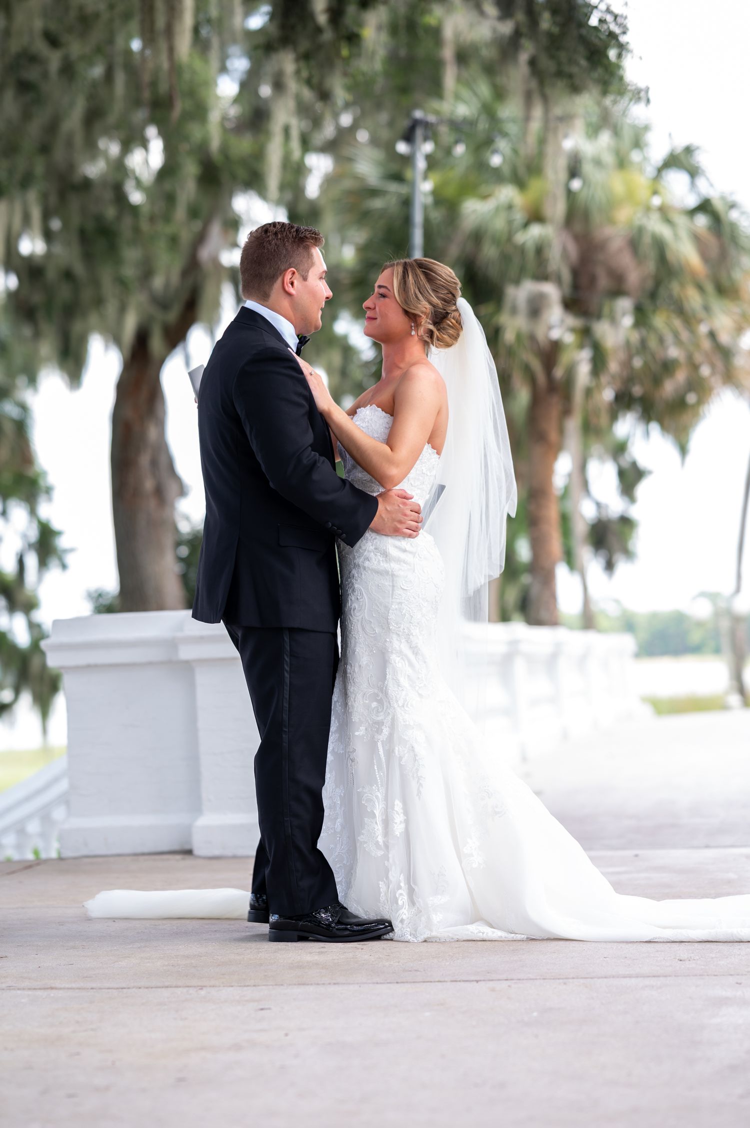 Timeless black and white portrait of newlyweds on the terrace