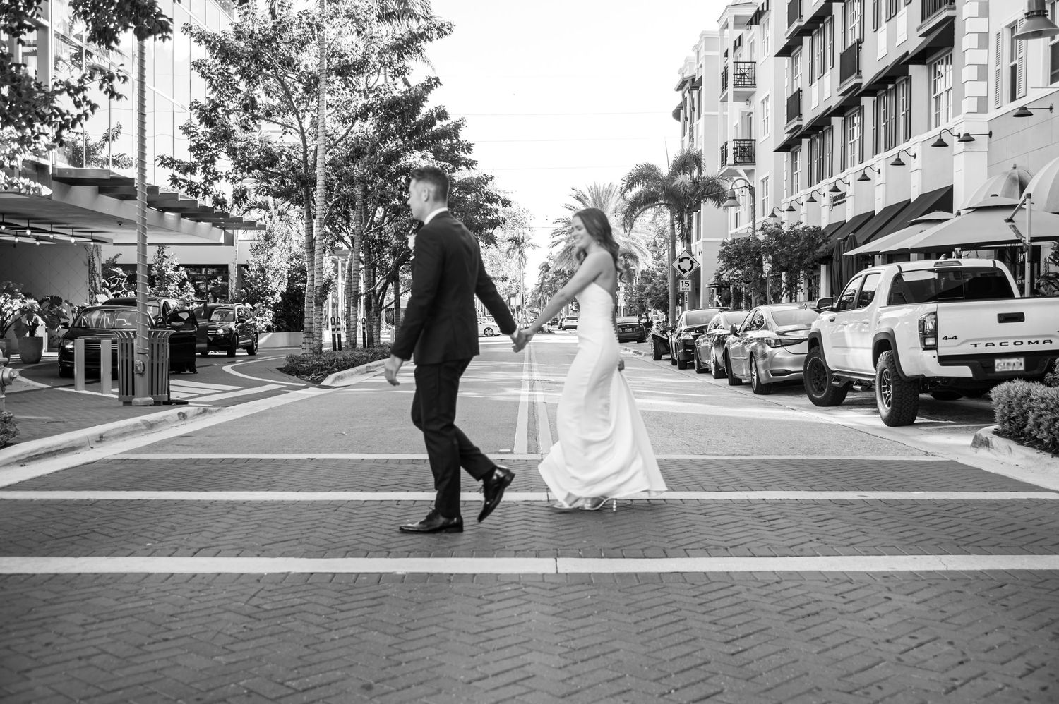 Candid rooftop wedding moments by wedding photographers in South Florida at Delray Beach's Ray Hotel