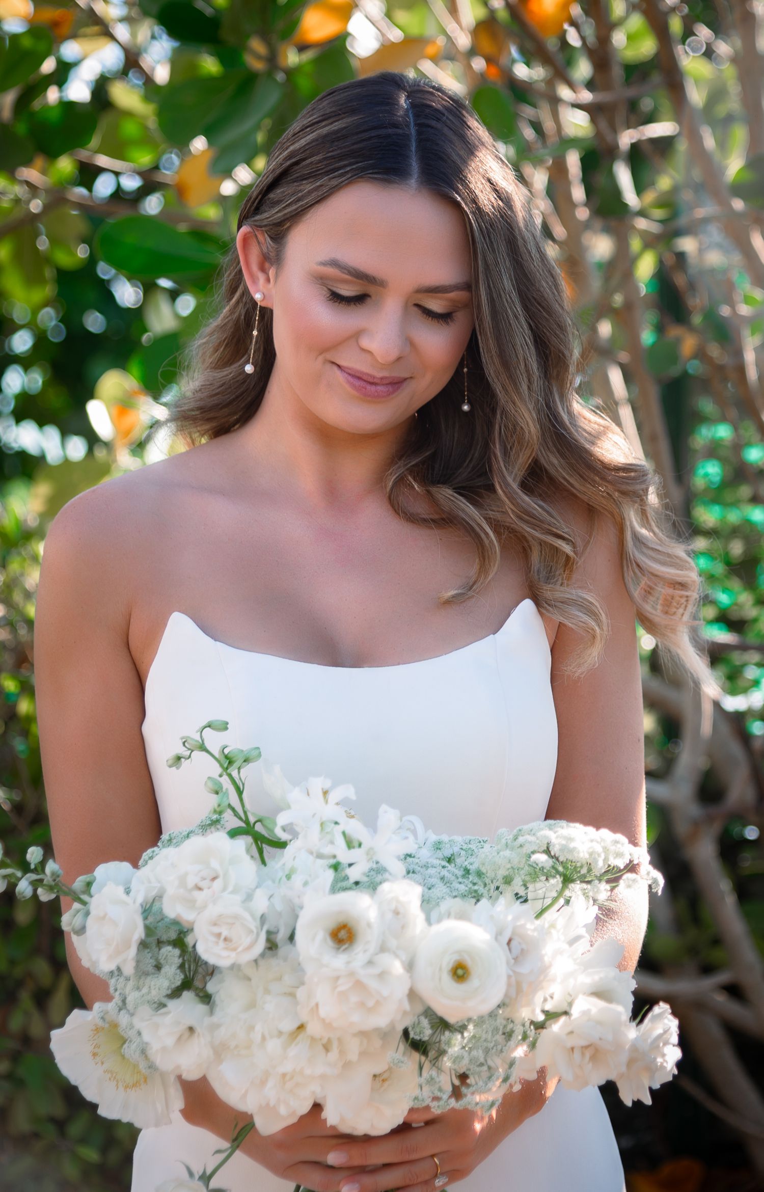 Emma walking down the aisle at The Ray Hotel, photographed by luxury wedding photographers in Florida