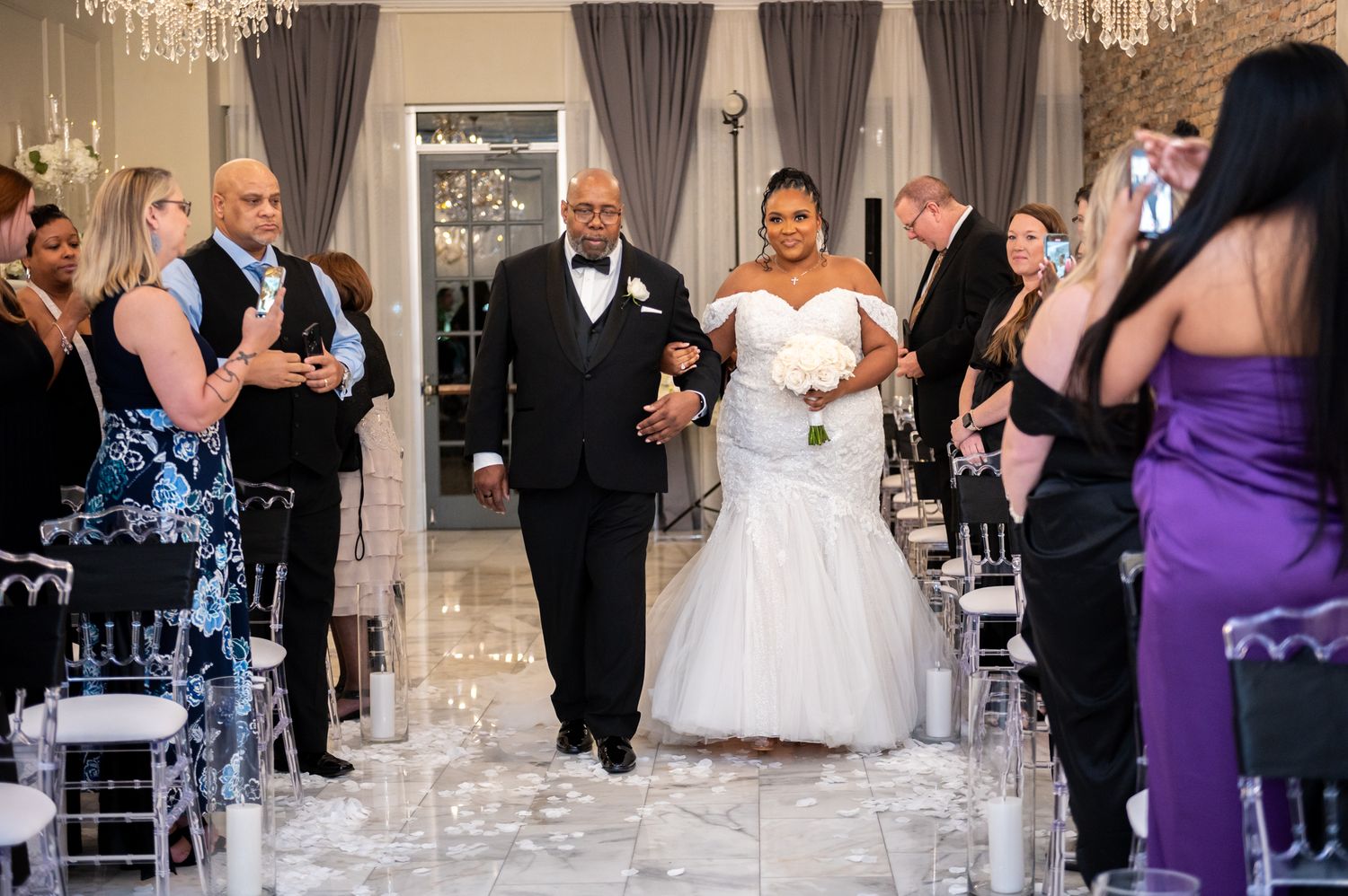 Luxury wedding cake with floral decorations at Florida reception