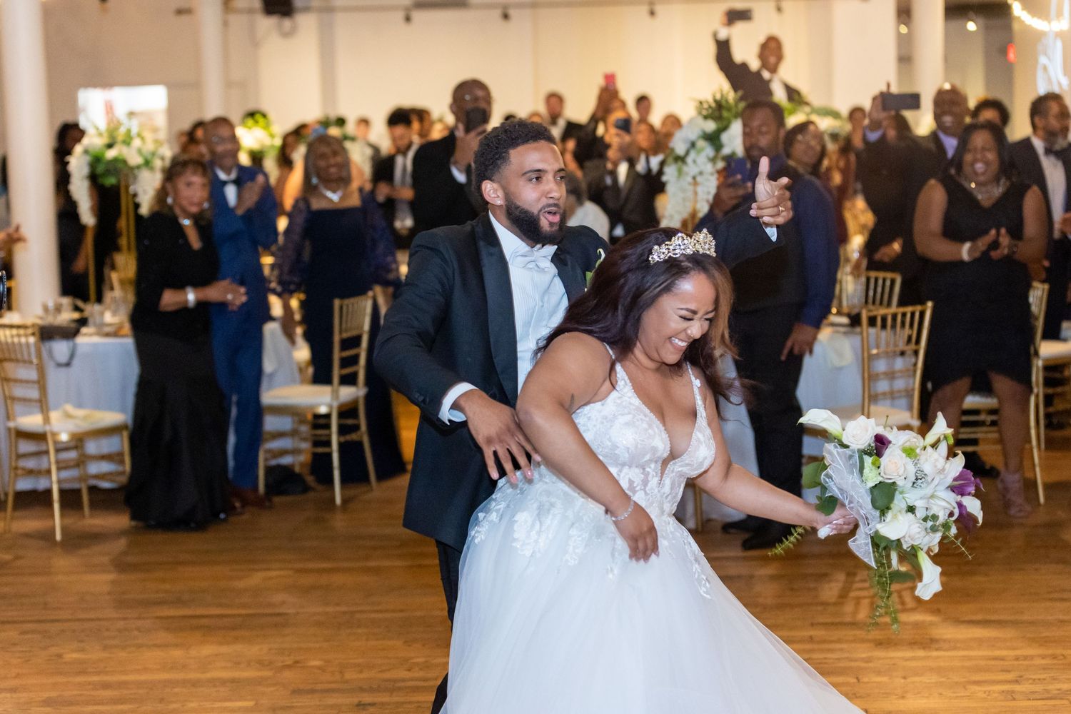 A Florida Destination Wedding Photographer travelled to Cincinnati for this destination wedding, and the groom dances with his wife
