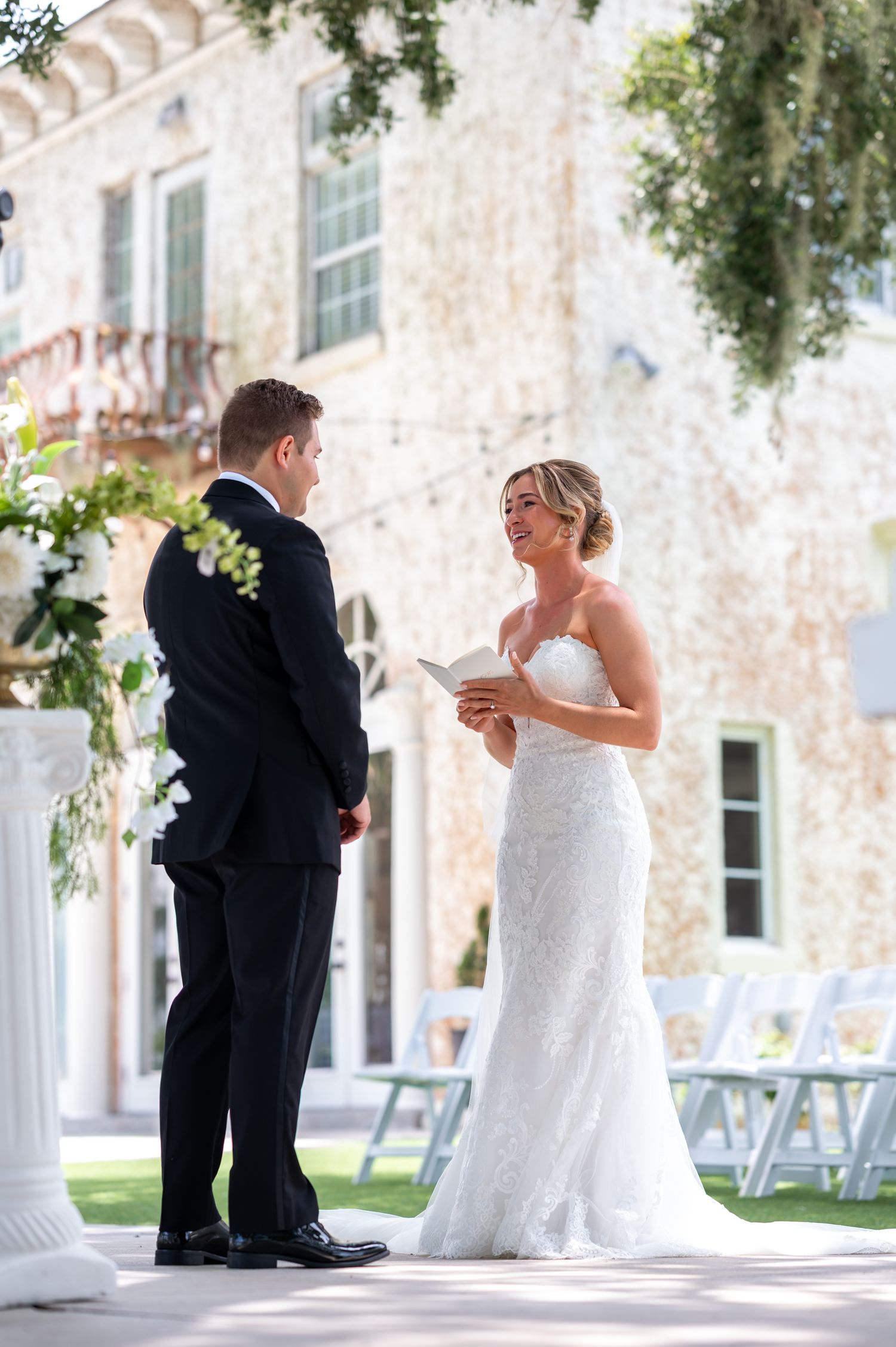 Luxury wedding photographers capture golden hour portraits by the lake