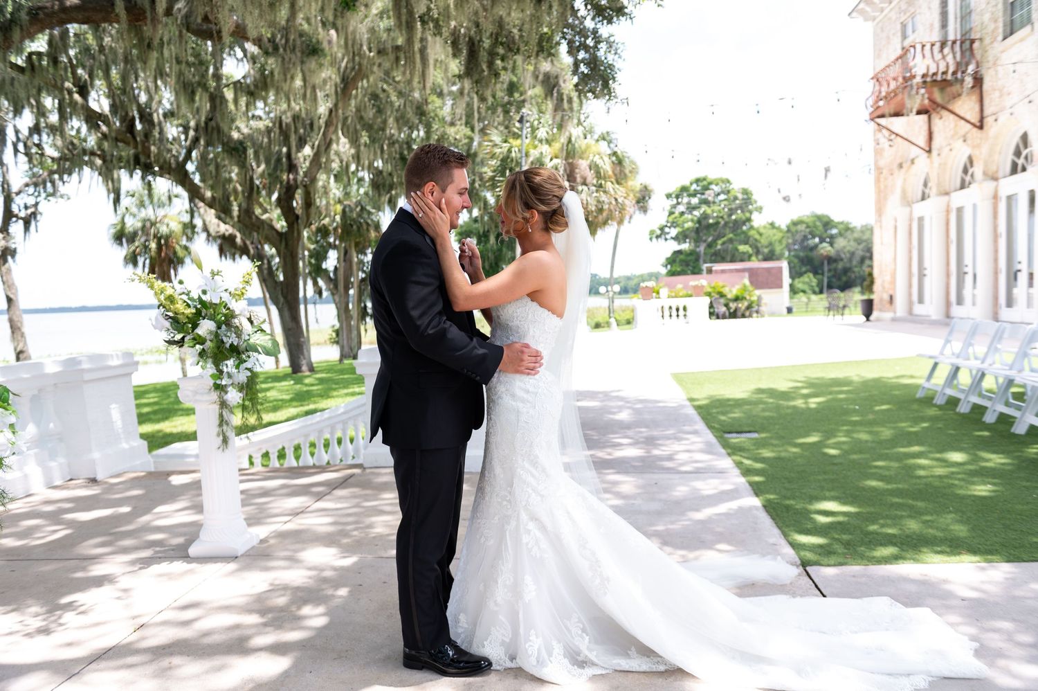 Romantic lakeside ceremony setup by luxury wedding photographers in Florida