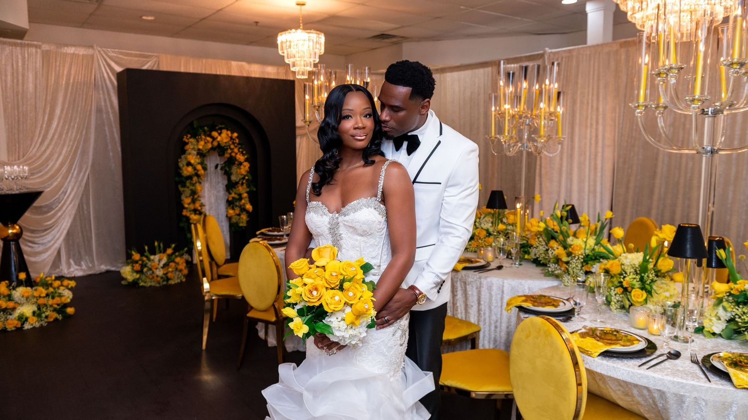 Che' Iheanacho & Mike Iheanacho walking down the aisle at a Palm Beach venue, captured by luxury wedding photographers in Florida.
