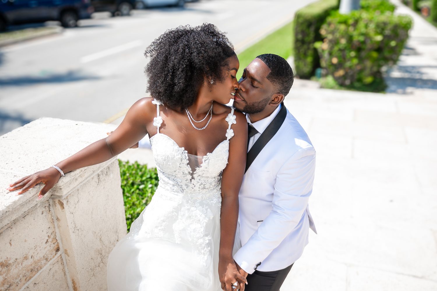 Palm Beach wedding photographers captured the bride & groom about to kiss during their Worth Avenue elopement photography session.