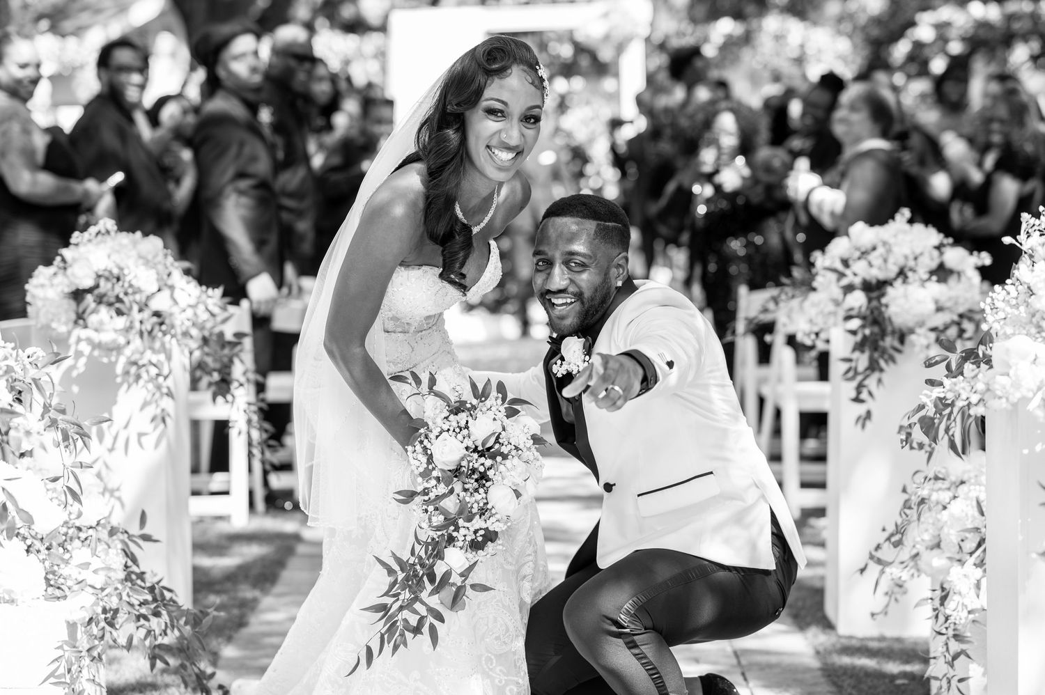 Luxury wedding photographers in Florida captured this bride & groom celebrating moments after their I Do's at Venue 1902 wedding venue