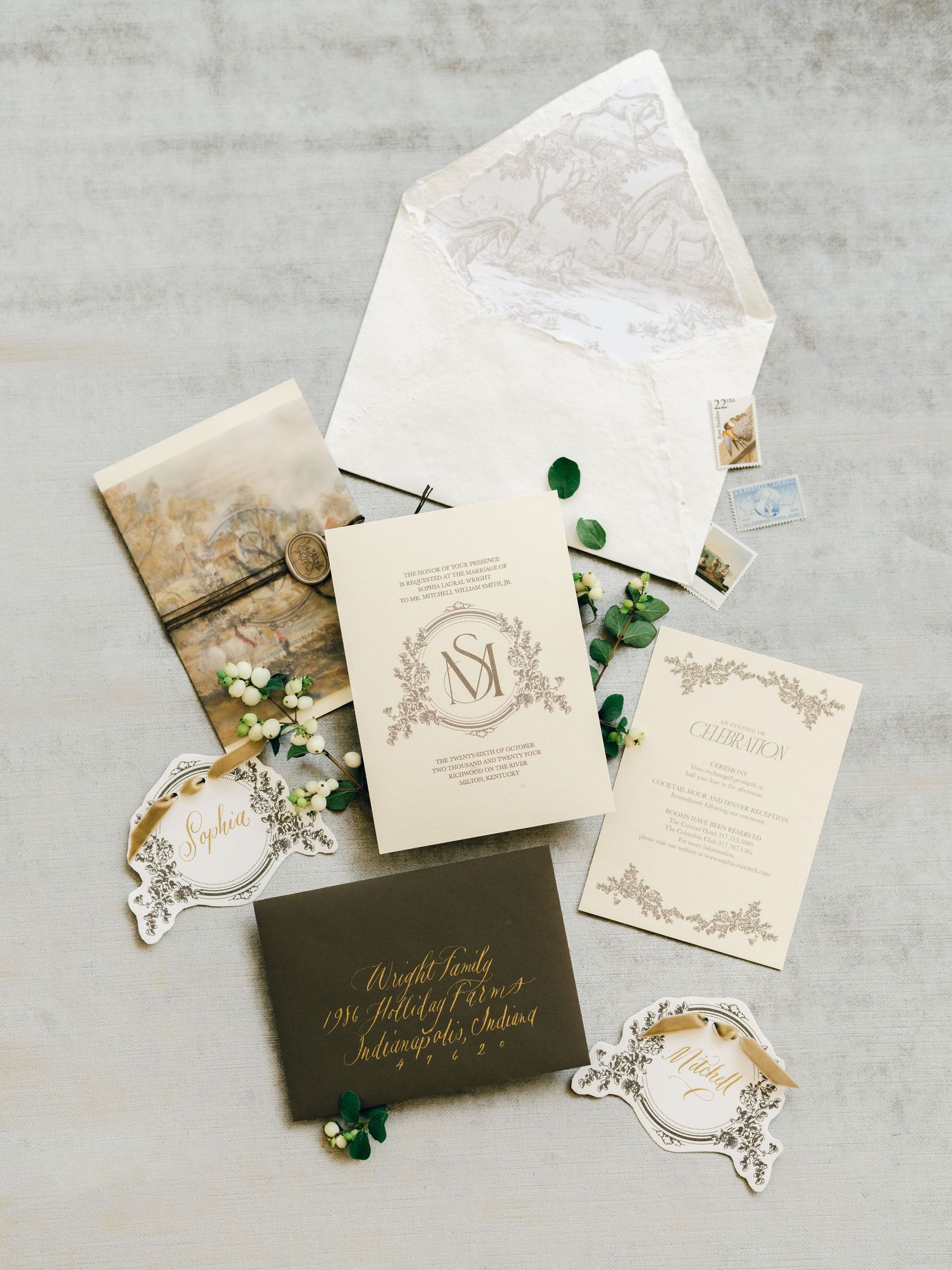 Elegant wedding invitation suite in ivory and gold with delicate floral details and calligraphy shown in a flat lay sequence.