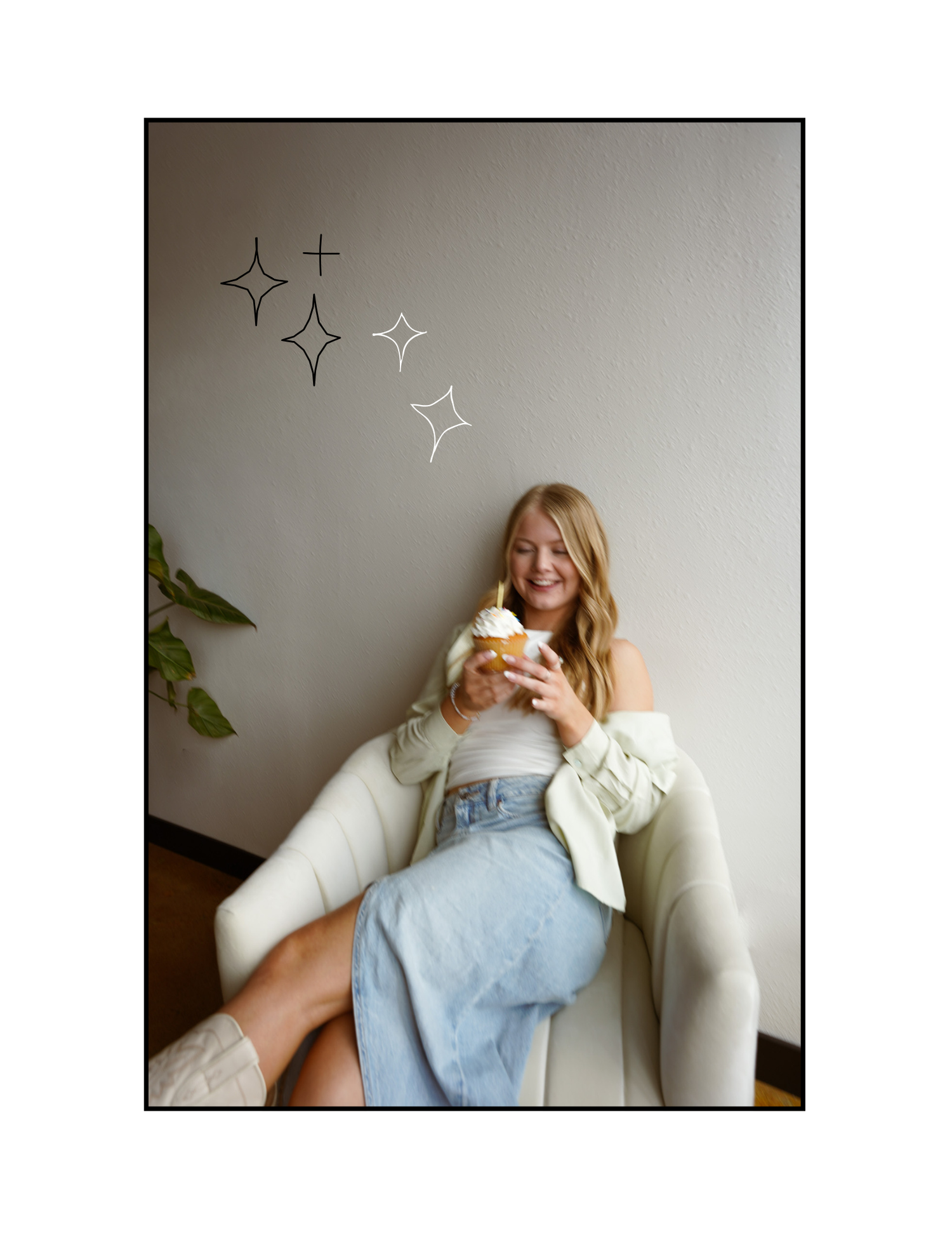 Person wearing casual blue top relaxes in white armchair while taking selfies at home.