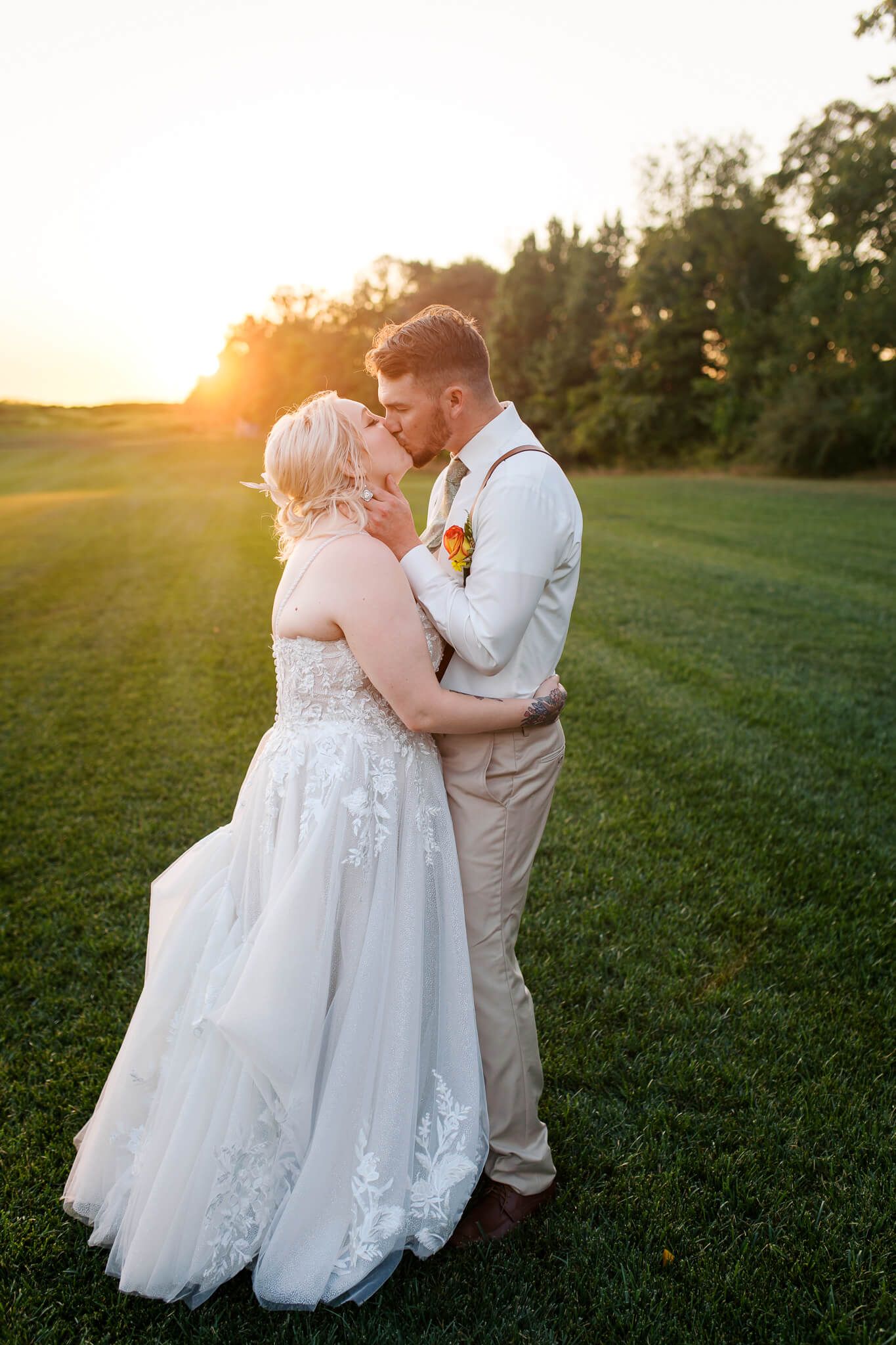 Sunset kiss during wedding in the woods at Pinehall Farms in Western Pennsylvania