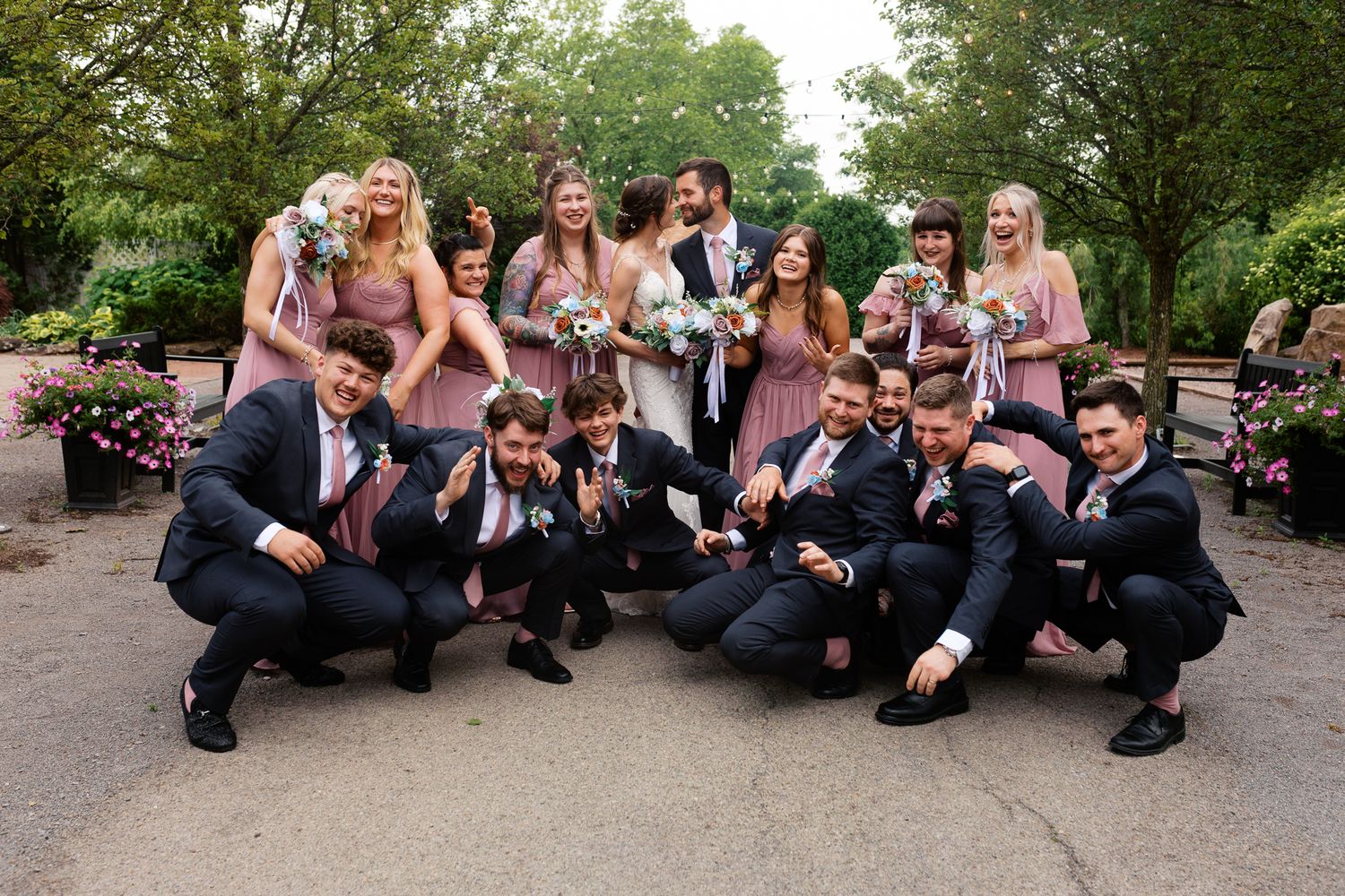 fun candid bridal party photo with bride and groom