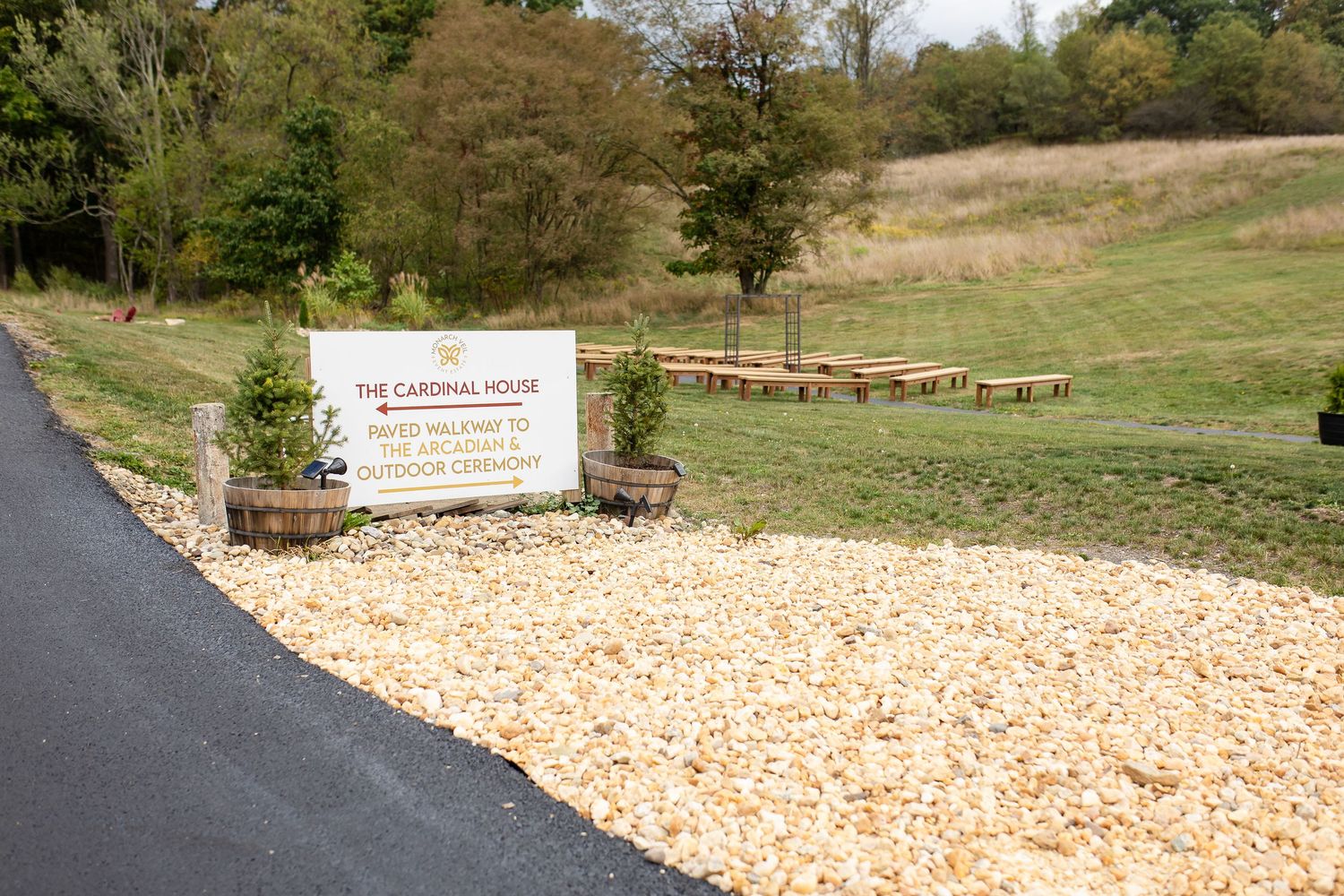 Sign showing which way to go for The Cardinal House and Outdoor Ceremony location