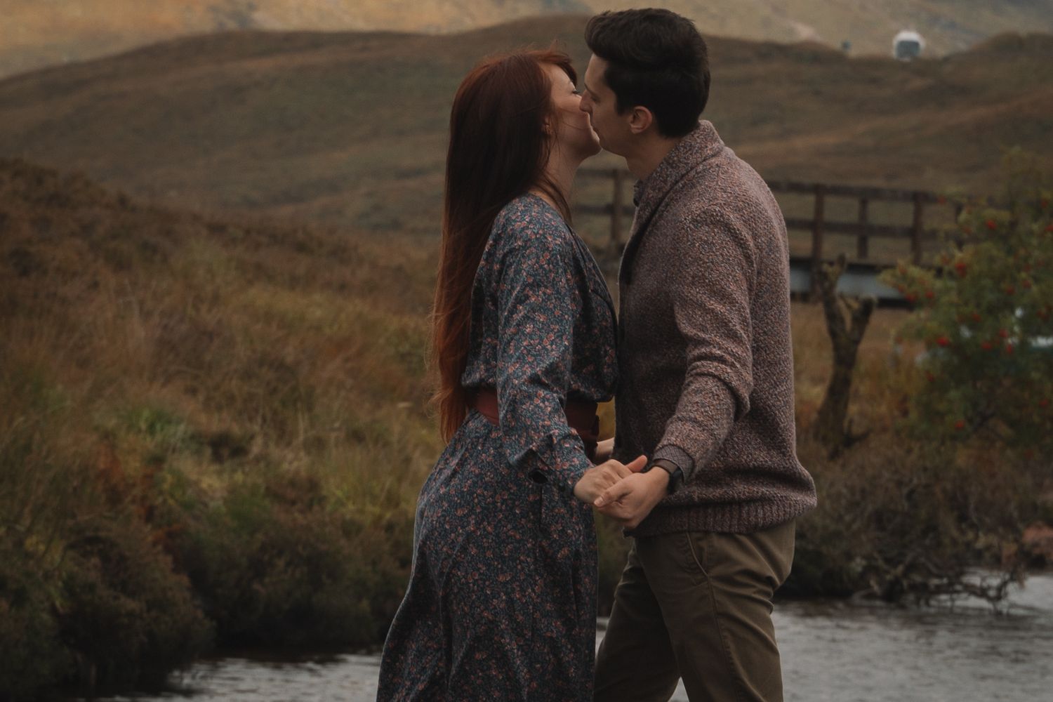 Emotional hug captured in natural Scottish landscape