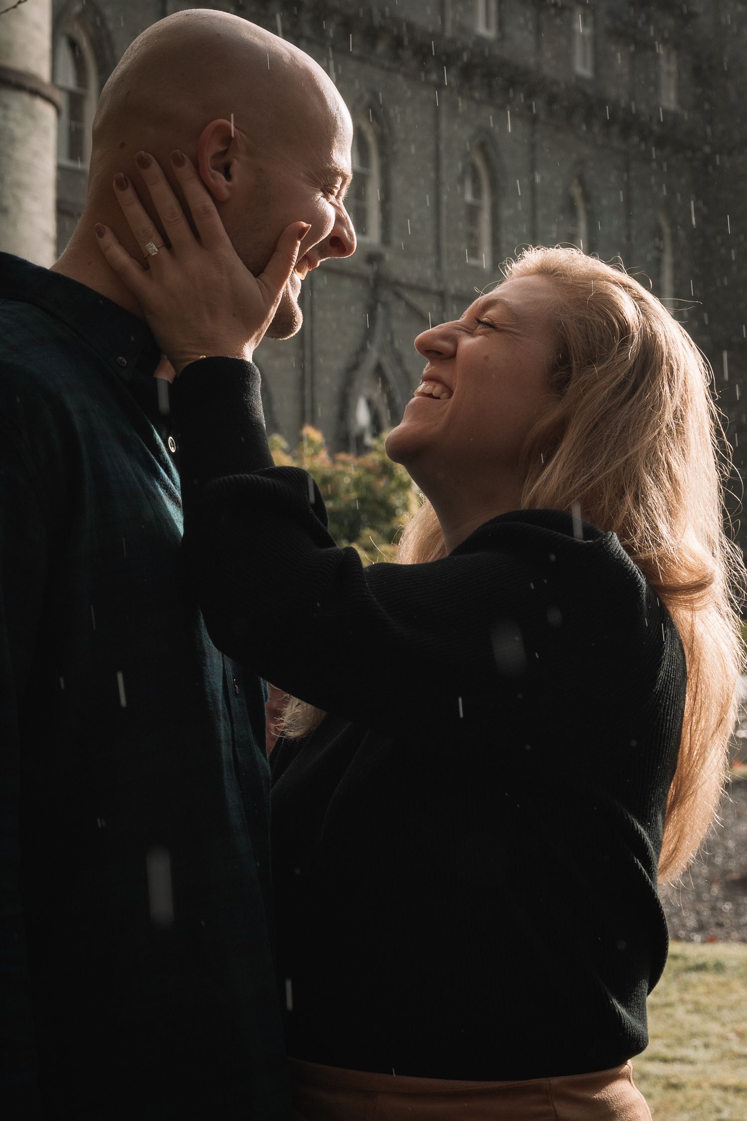 Candid moment during engagement session at Inveraray Castle, Scotland