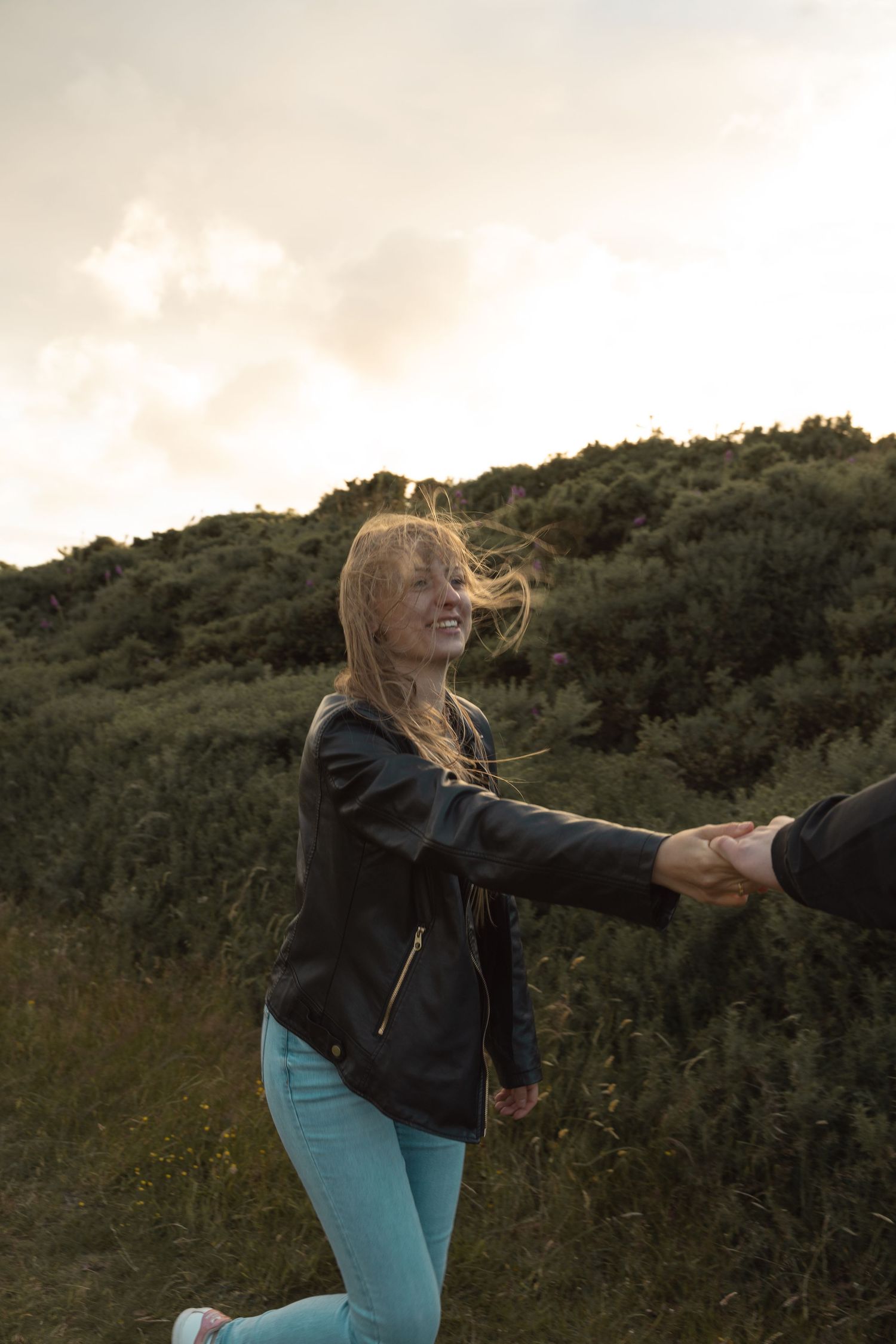 Natalia and David sharing a quiet moment in the hills