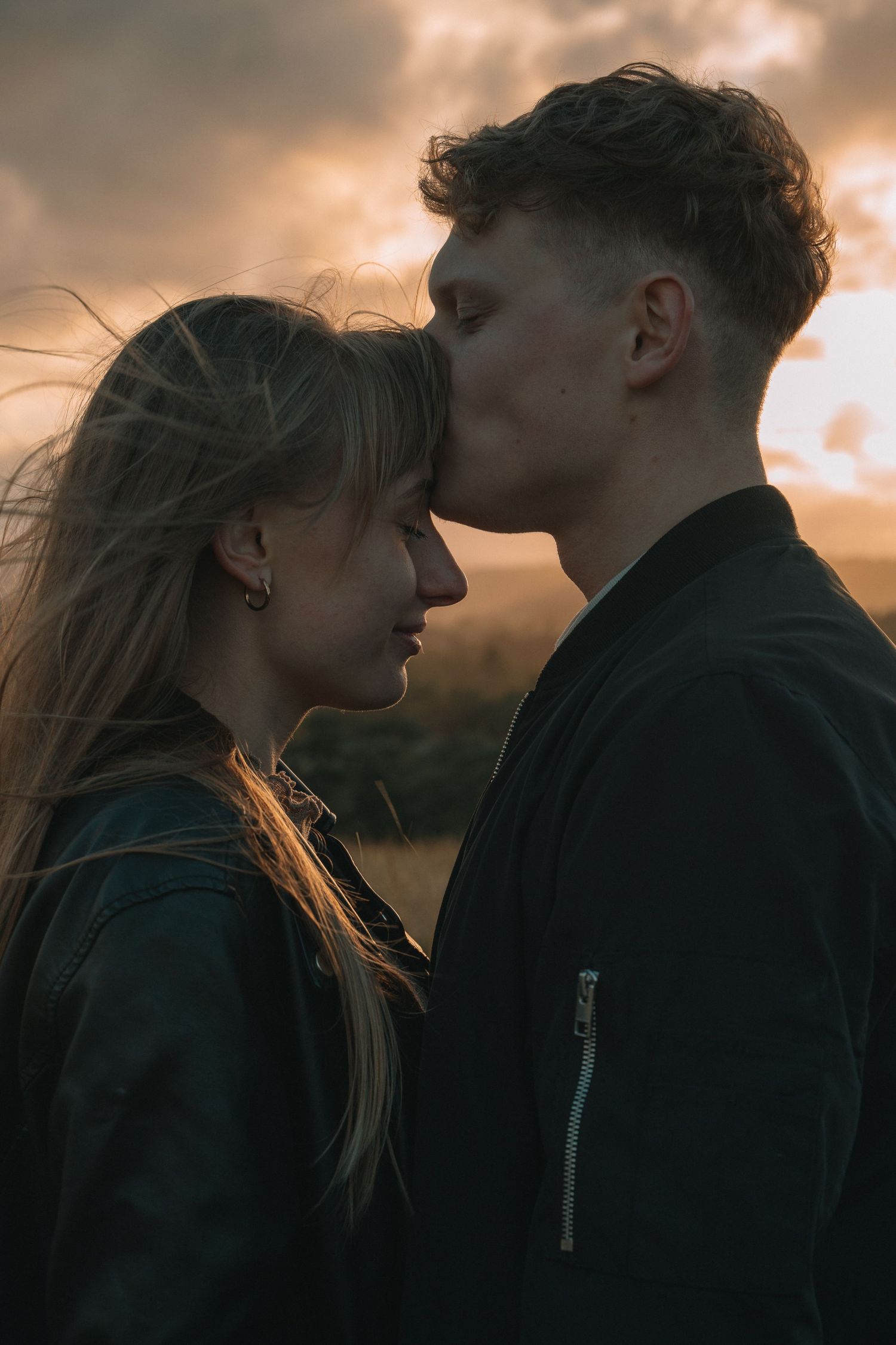 Natalia and David sharing a quiet moment in the hills