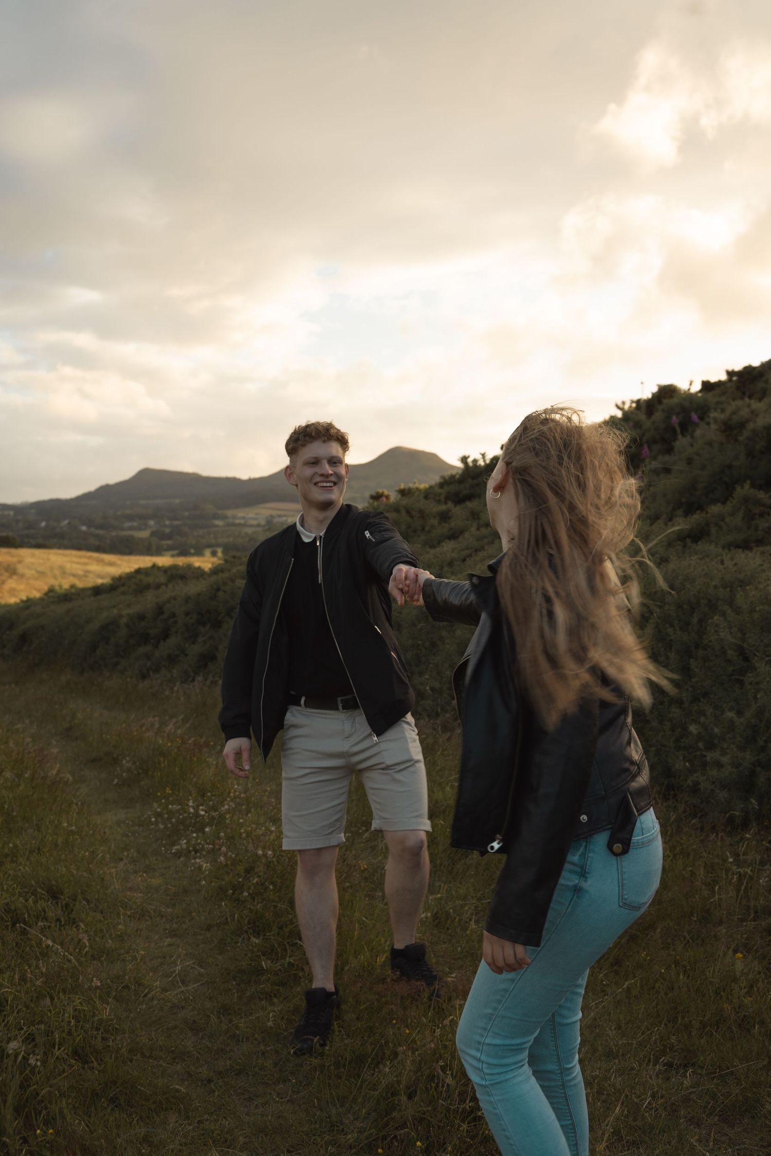 Natalia and David sharing a quiet moment in the hills
